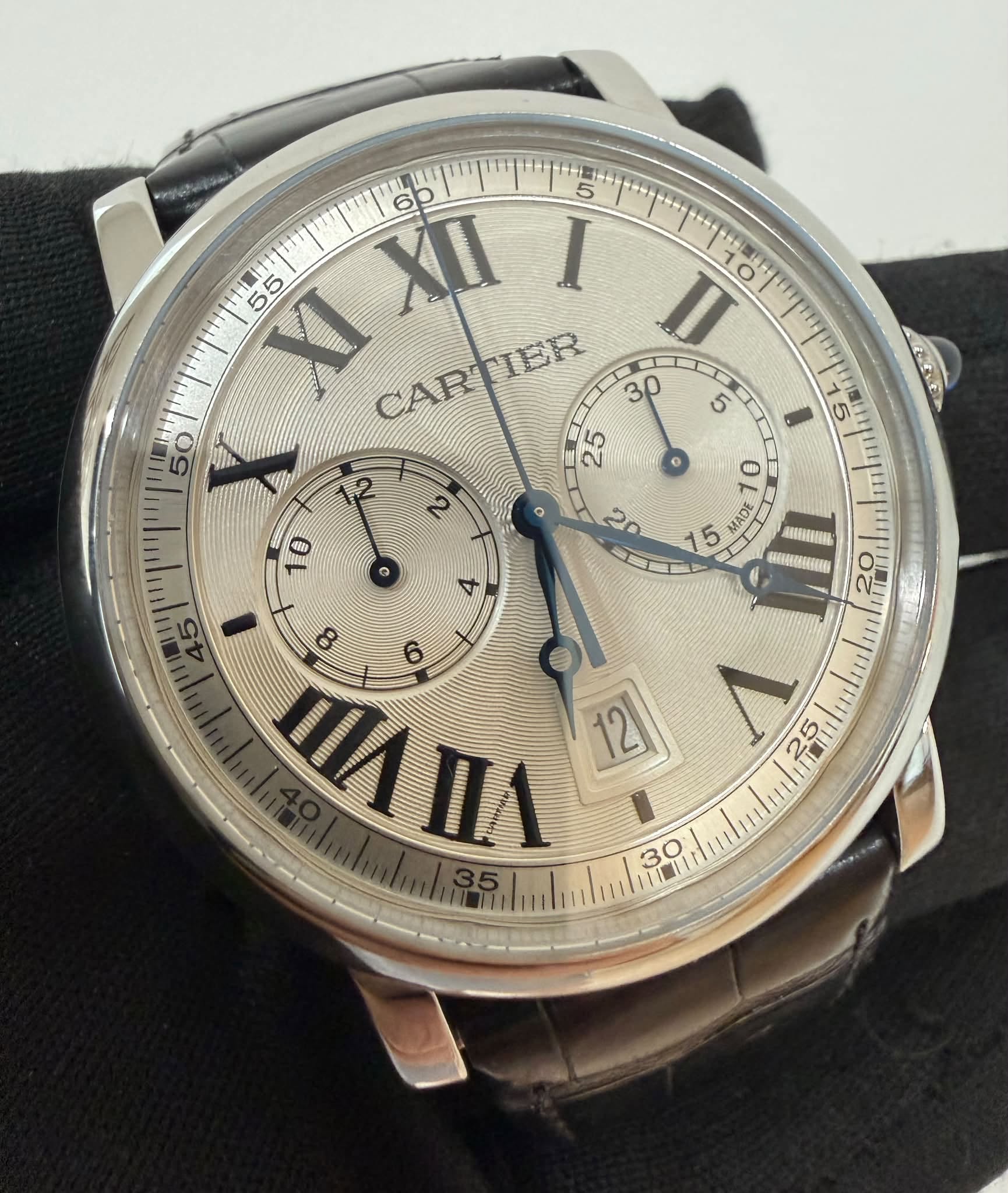 May be an image of wrist watch and text