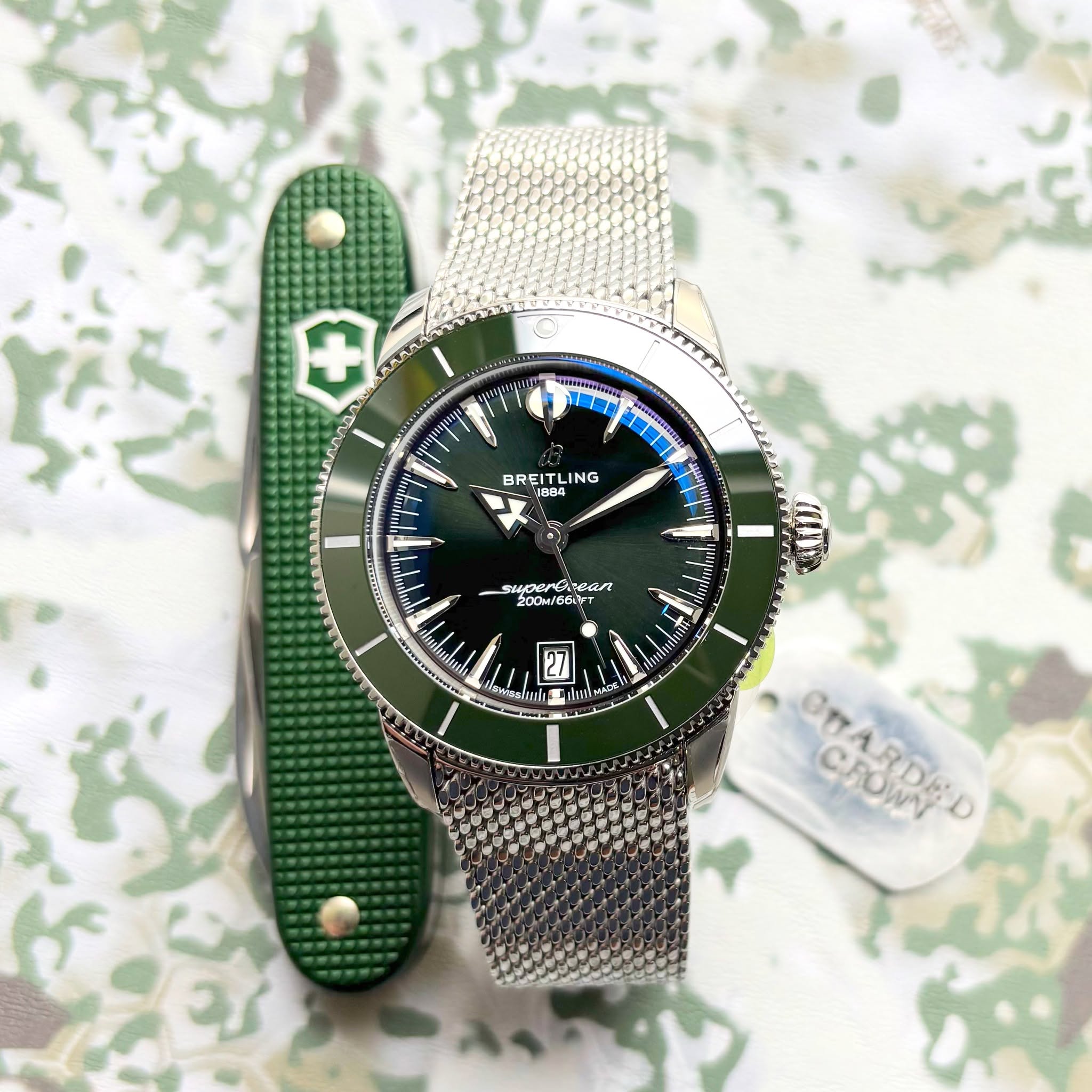 May be an image of knife, wrist watch and text