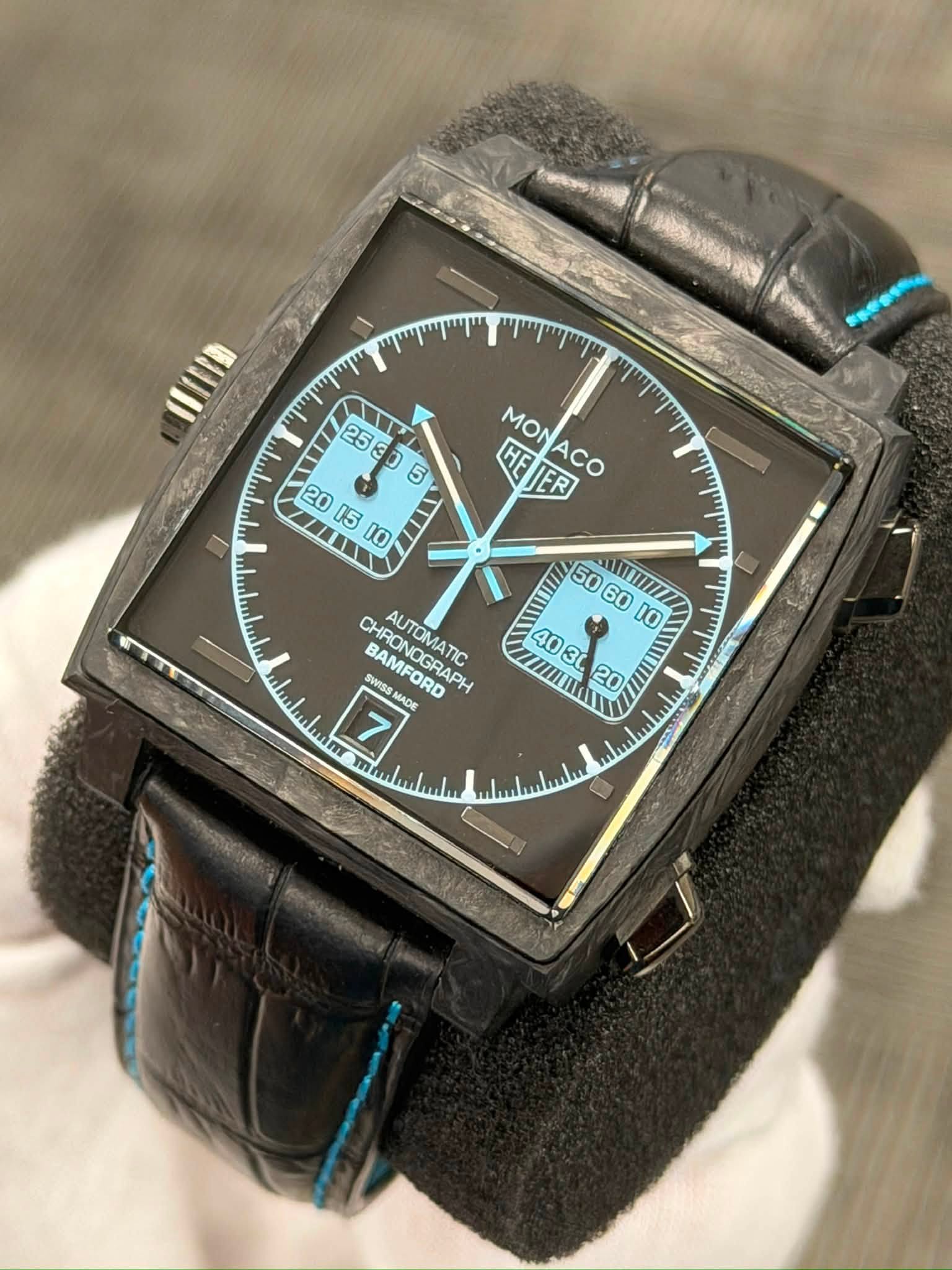 May be an image of digital watch and text that says 'ישוייויוייוי MON HEIER MONACO AAWWИ 60 10 40 IIII CHRONOG C سلساس HRONGGHA BAUNOGRAO CHRONOGRAPH AUTOMATIC SYASS BAMFORD m 7…