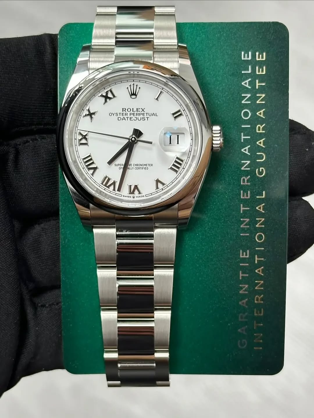 May be an image of wrist watch and text that says 'I XI W ROLEX OYSTER TREUTUAL TUAL DATE ATEJUST II IX VIII SUPER OF LYCERTFIED CHRSNEMETER መ VII け MADO V Sess MADE VIm 10100…