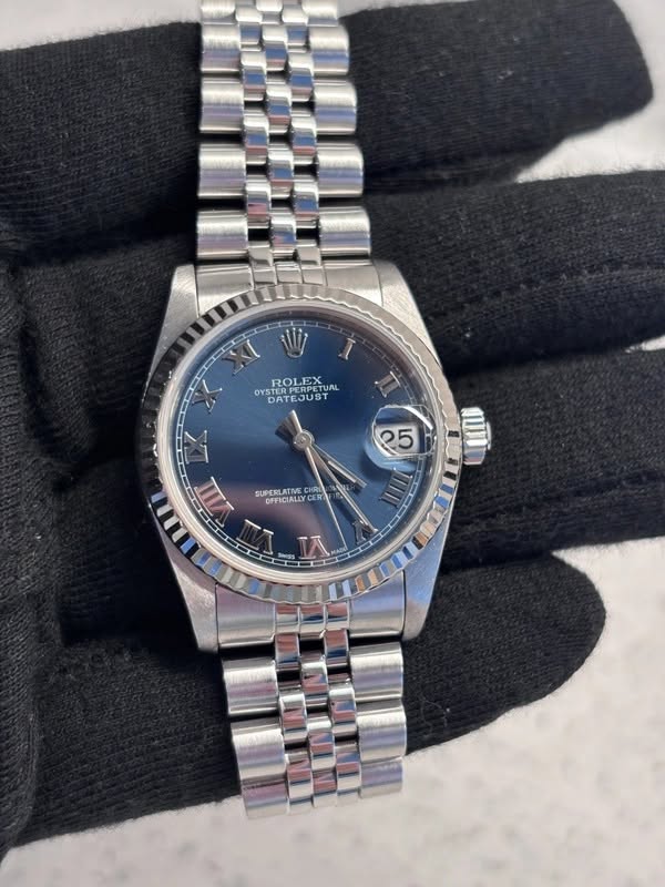May be an image of wrist watch and text that says 'W I ROLEX OYSTERCOUST TERPERPETUAL ODETUR TUAL OYSATEJUSYAL OYS OYSTER YSTERPERPETU 2oлK DATEJUST ก is 25 SUPERLATIVE CHRE…