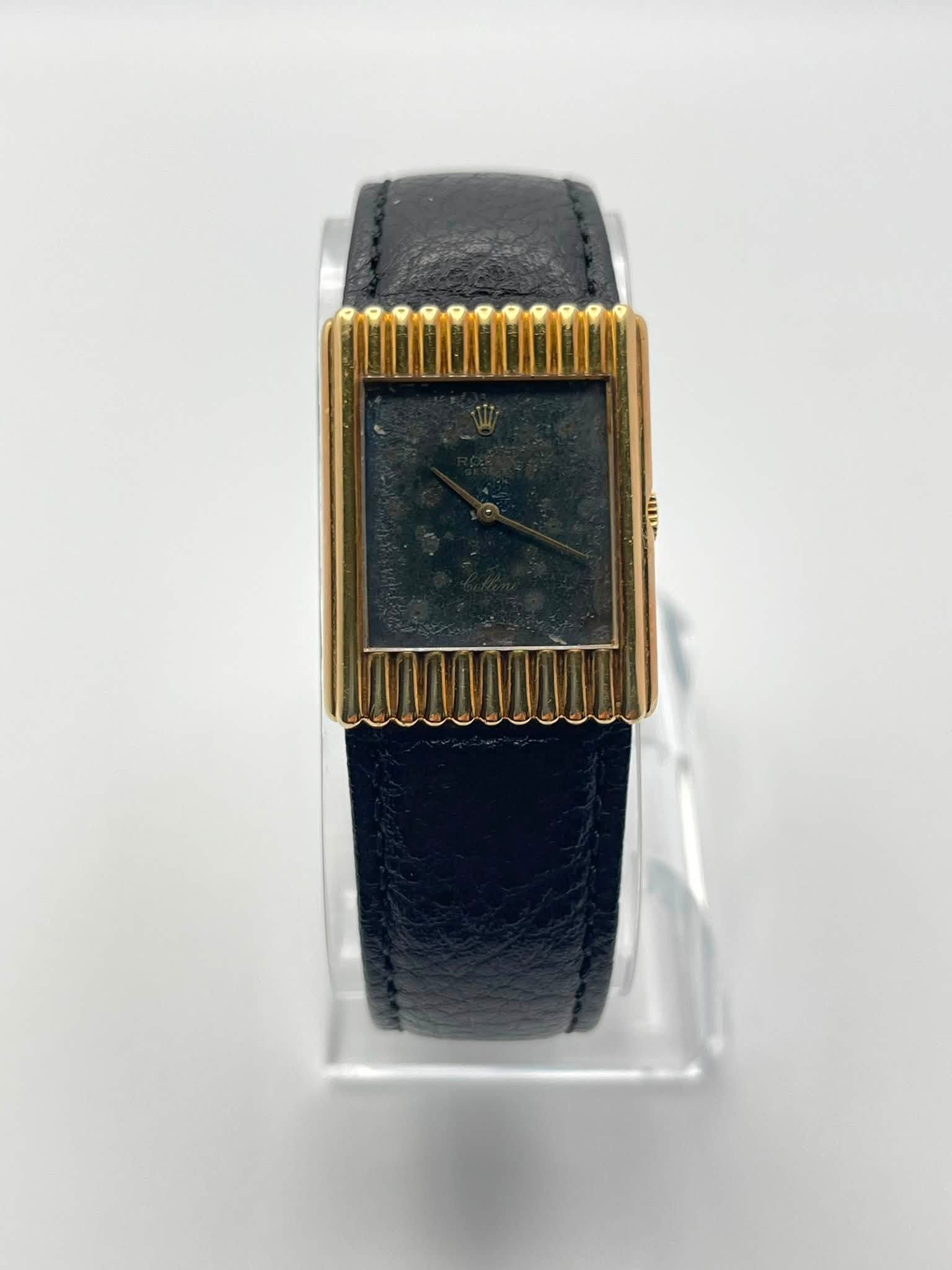 May be an image of wrist watch