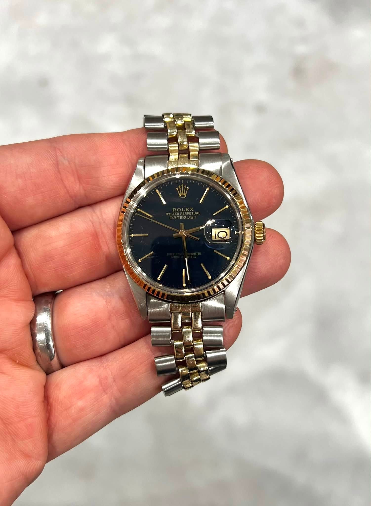 May be an image of wrist watch