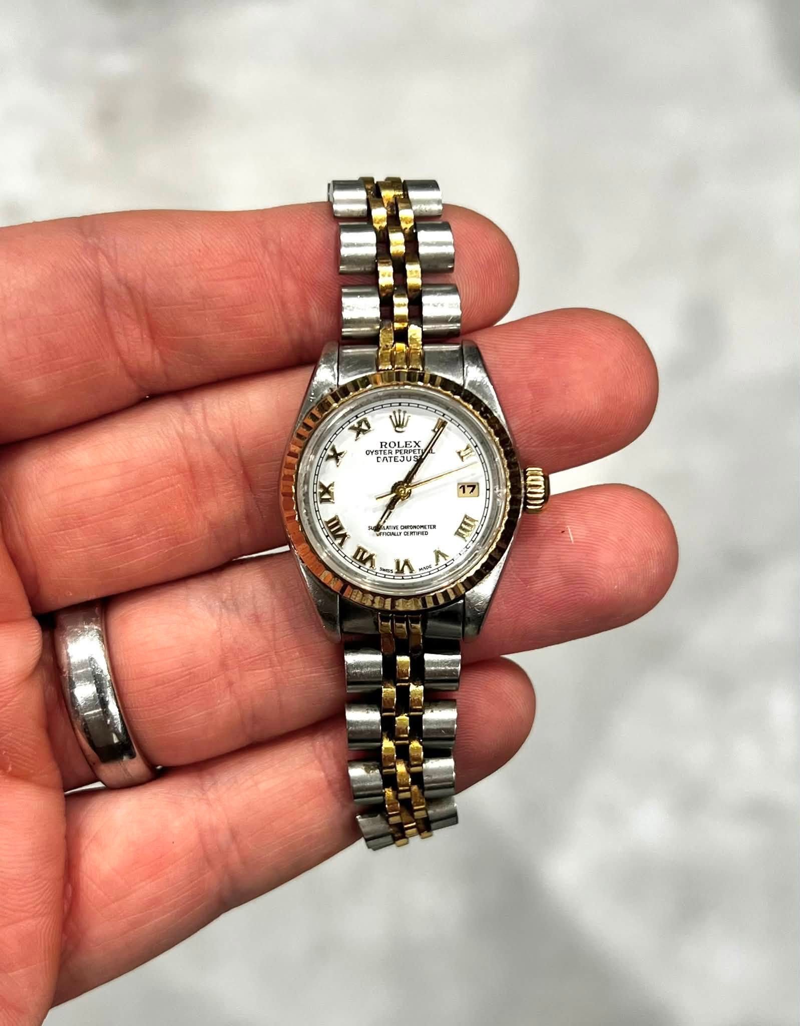 May be an image of wrist watch and text that says 'プ Prarik PYSTEN ROLE YSTERPERPE INP OL EX E CATEJL EJUS PIEU VI 17 MY መመኒ X I фomb- ORA лι VI'