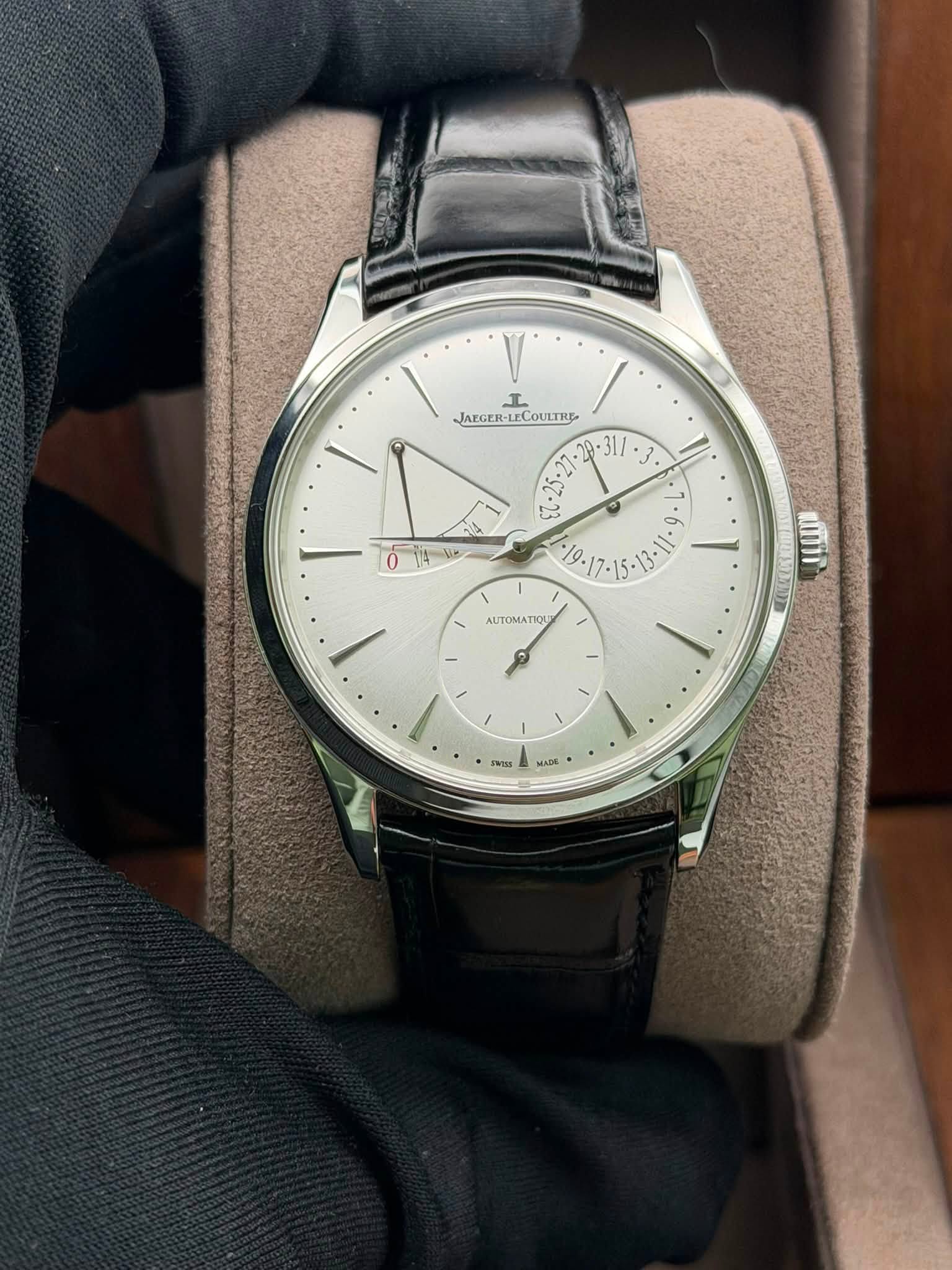 May be an image of wrist watch and text