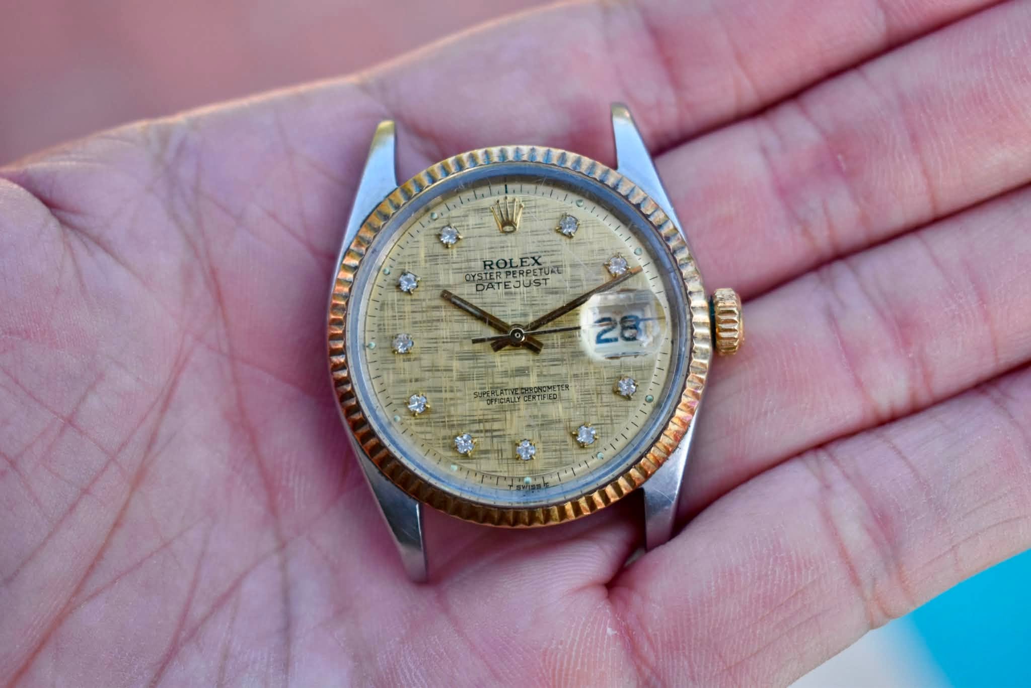 May be an image of wrist watch and text that says 'ROLEX OYSTE OSTERPERUSTURE STERPERPETURT PERPETURI DATEJ EJUS 28 aN O.'