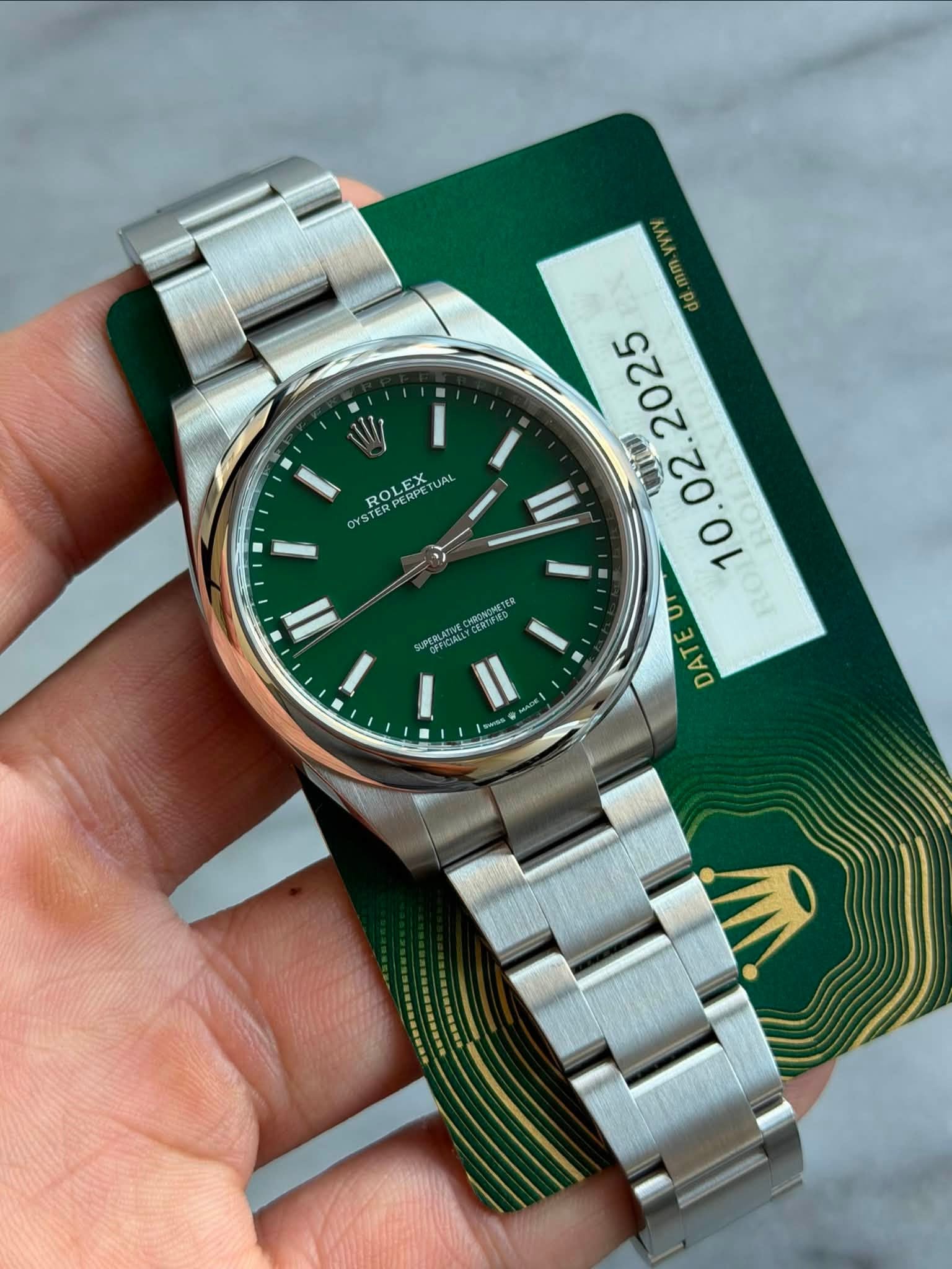 May be an image of wrist watch and text that says '1 YSTERPERPI STERP ROL ROLEX ROR TERPERPETU AL II CHRONONETE CERTSILO PERLATATE 0 دي DAT SaSs DSONE'
