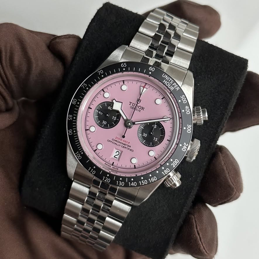 May be an image of wrist watch and text