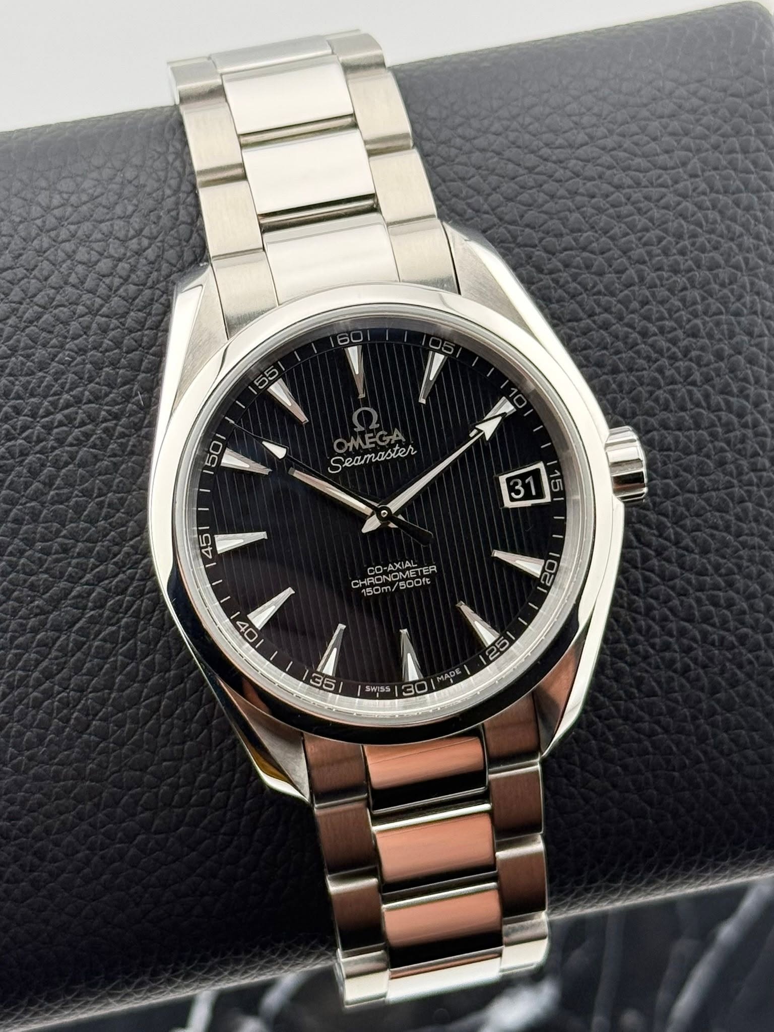 May be an image of wrist watch and text that says '60 55 50 Seamaster 45 31 15 CD-AXIAL PANS ER 150M HRONOMETE /90Oft 로 7 102 35 O 25 SWISS 30 MAR nAp'