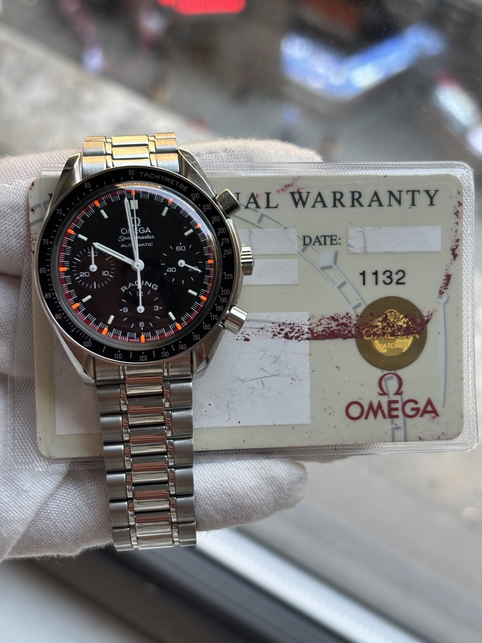 May be an image of wrist watch and text