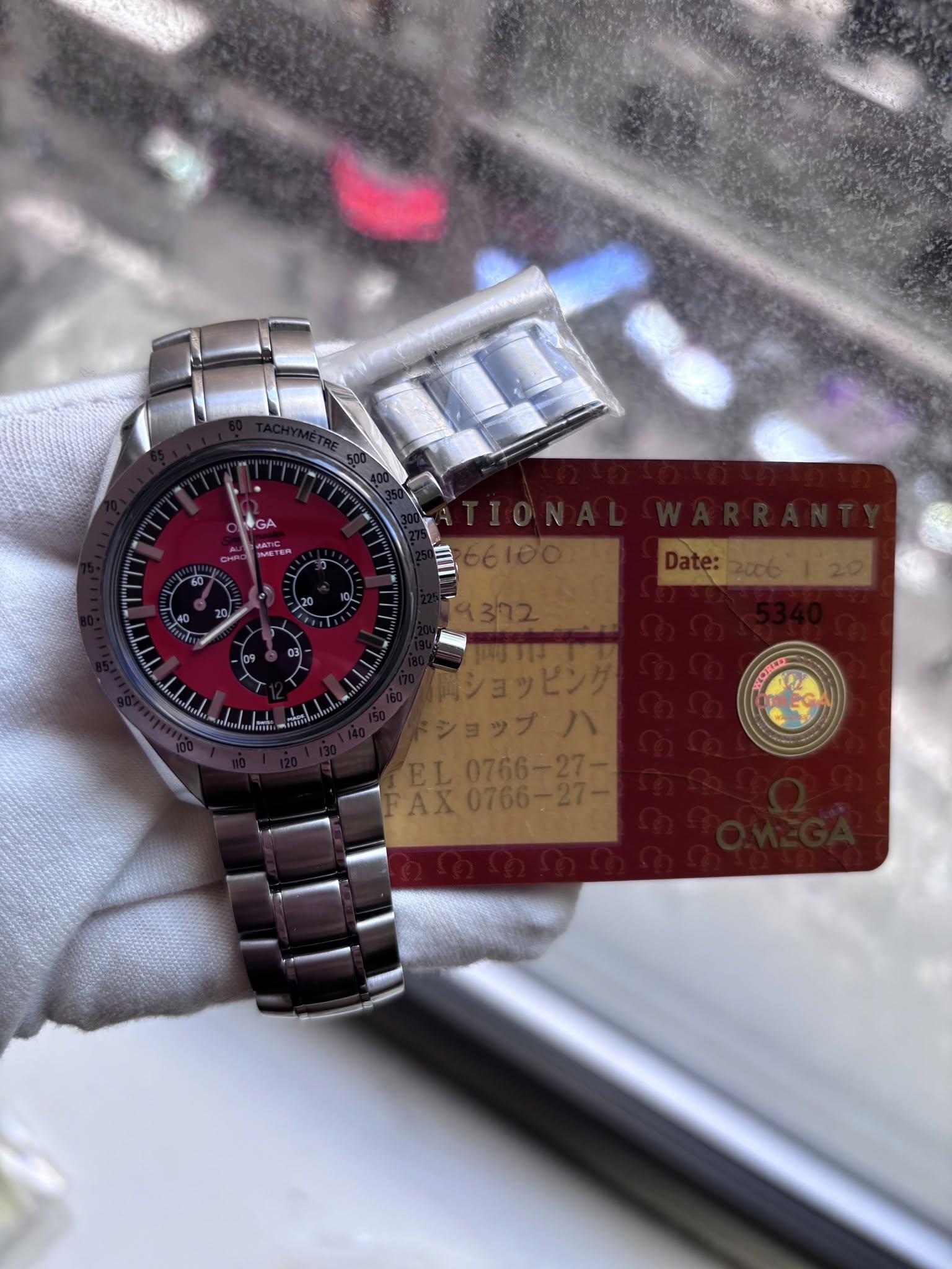 May be an image of wrist watch and text