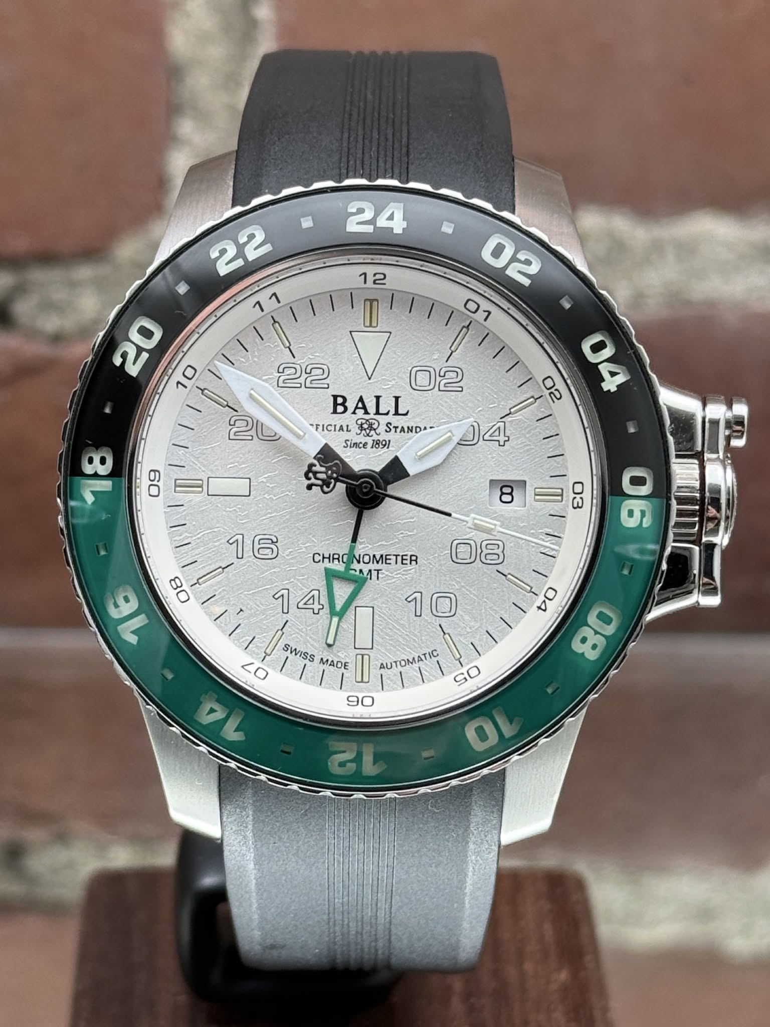 May be an image of wrist watch and text that says '24 = II 22 V 02 BALL "FICIAL FR STANDA- Since C II 4 8 II CHRONOMETER CHRO NOMETER MT 14/1 14 10 SWISS MADE II ΑИΤOMATИC so 50 7L…