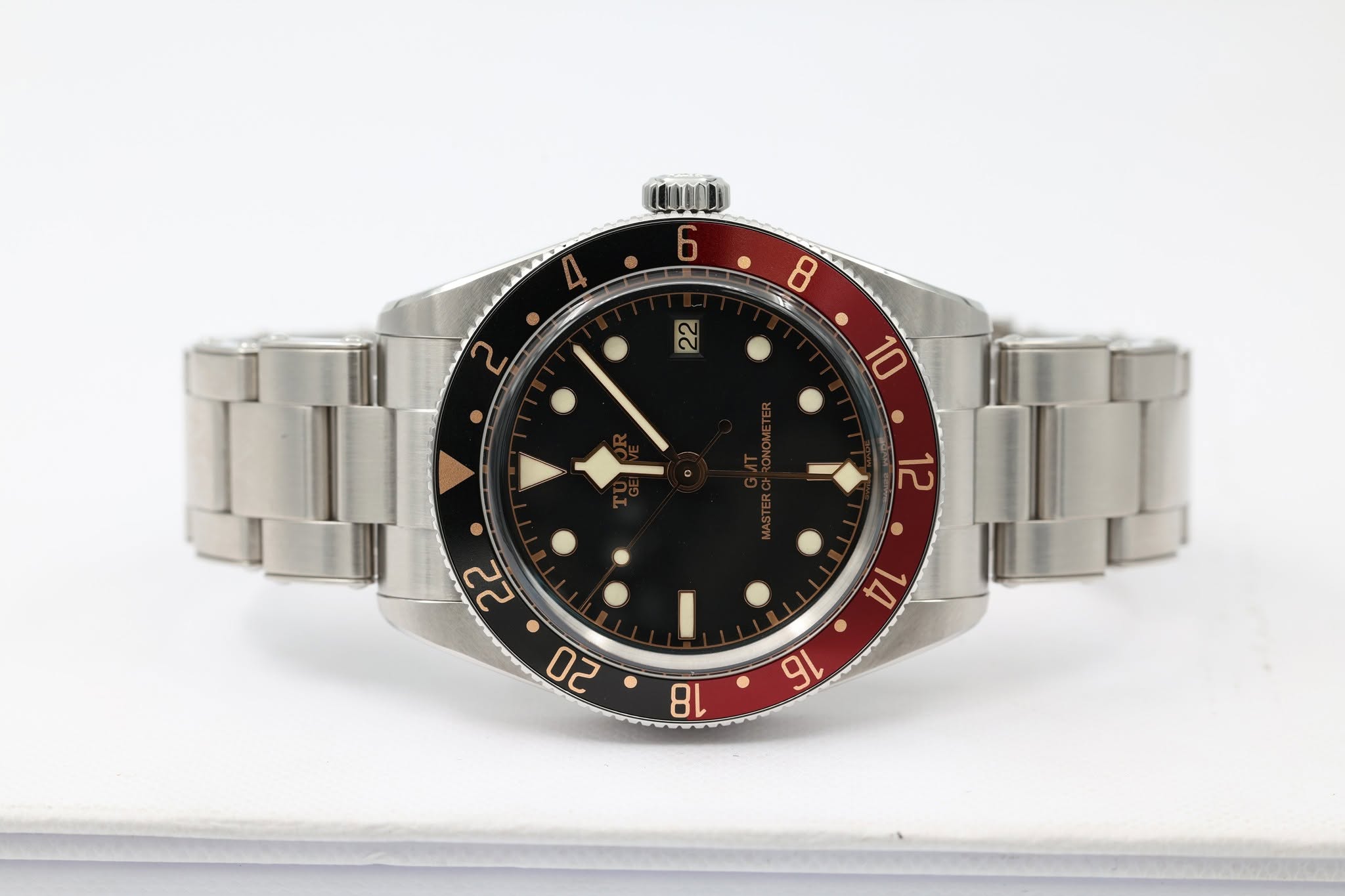 May be an image of wrist watch and text