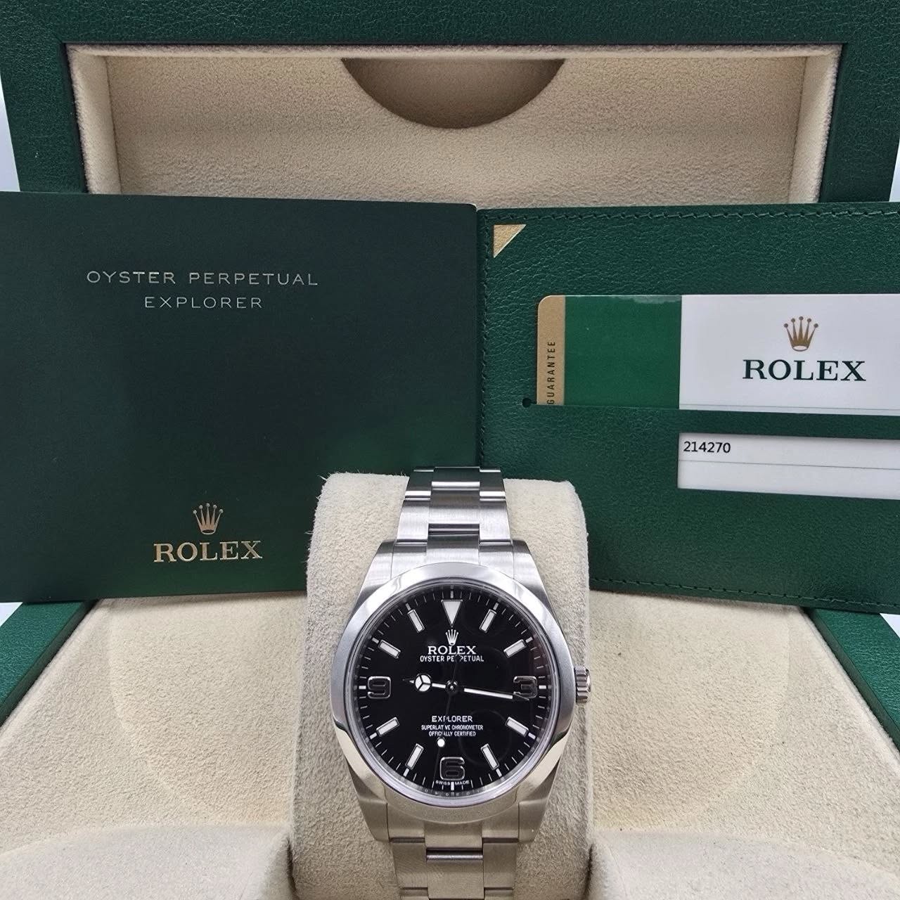 May be an image of wrist watch and text that says 'OYSTER PERPE RPERPETUAL OYSTERPERPETUAL ETUAL EXPLORE VARANTEE ROLEX 214270 ROLEX ROL T ROt OL R ROLEX OTERT SPE PMSOaNE EXILORER…