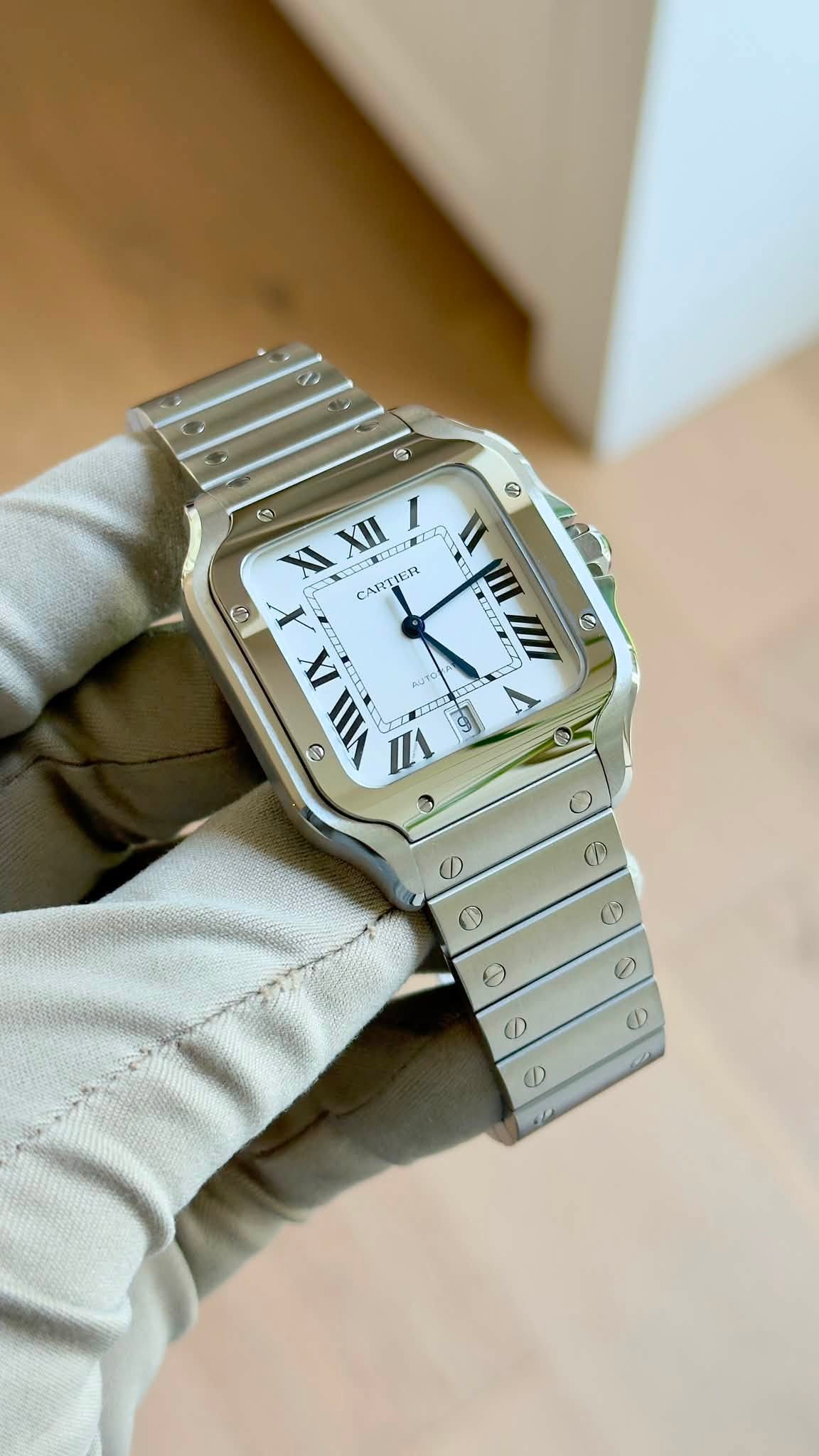 May be an image of digital watch and text that says '億) G ® ه ( 0 XI XII E CARTIER D X IX AUTE AUTO O ब। ITI 9 NEZZ IIII EIZ e ٥ P O ١ D D'