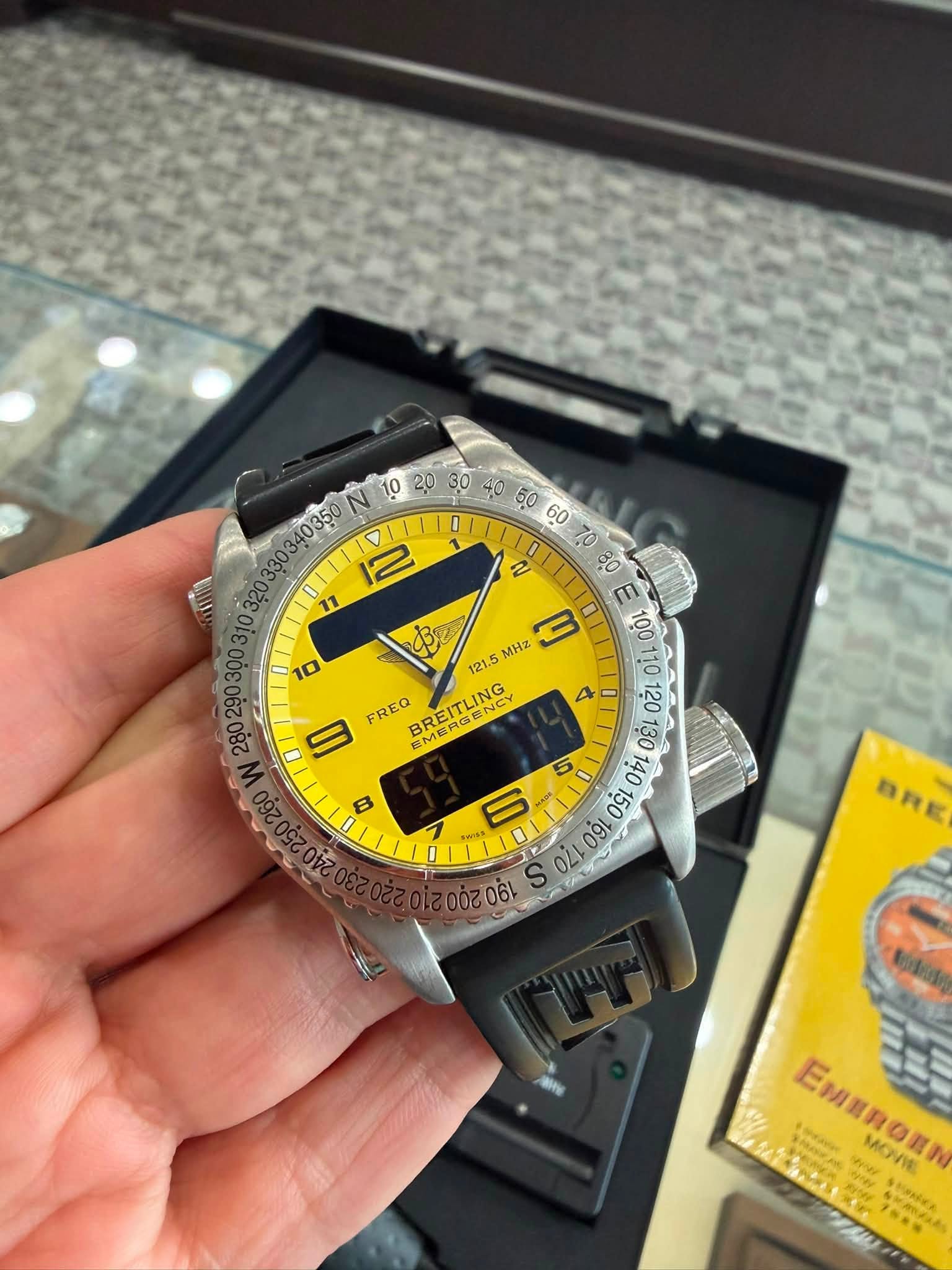 May be an image of wrist watch and text