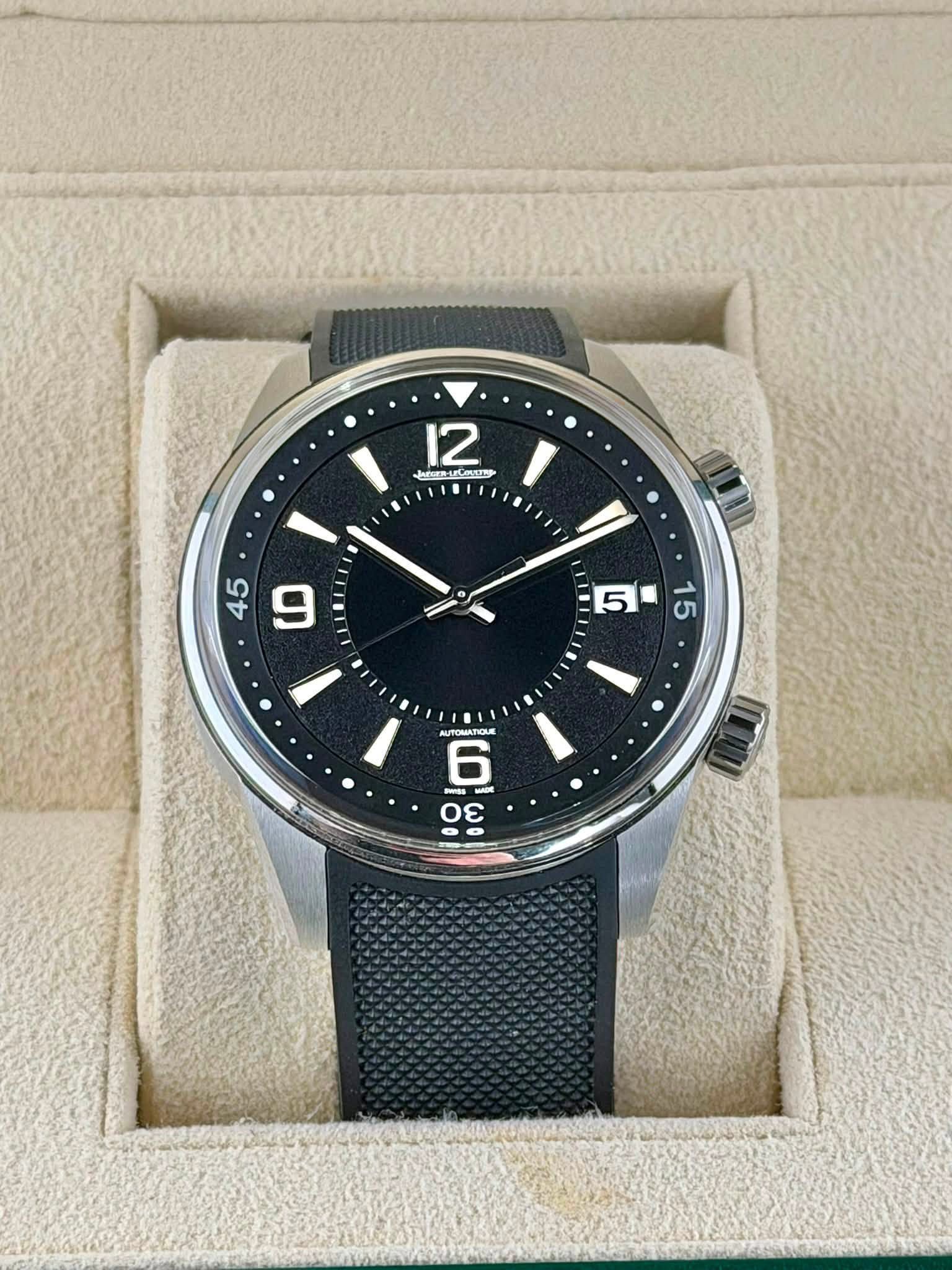 May be an image of wrist watch and text