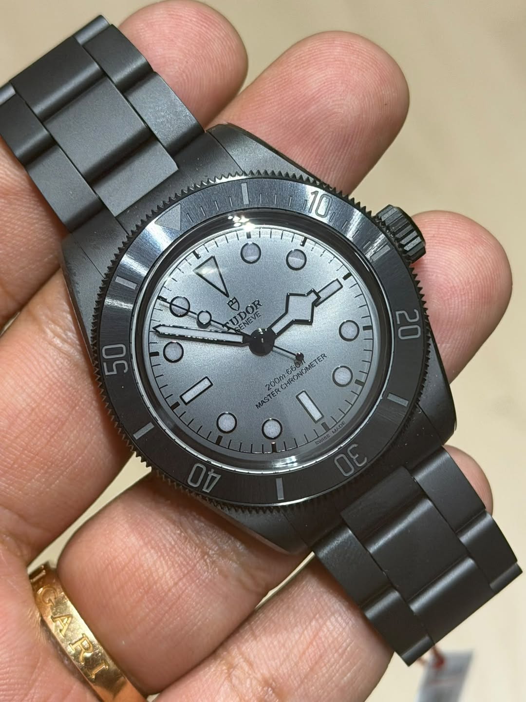 May be an image of wrist watch and text