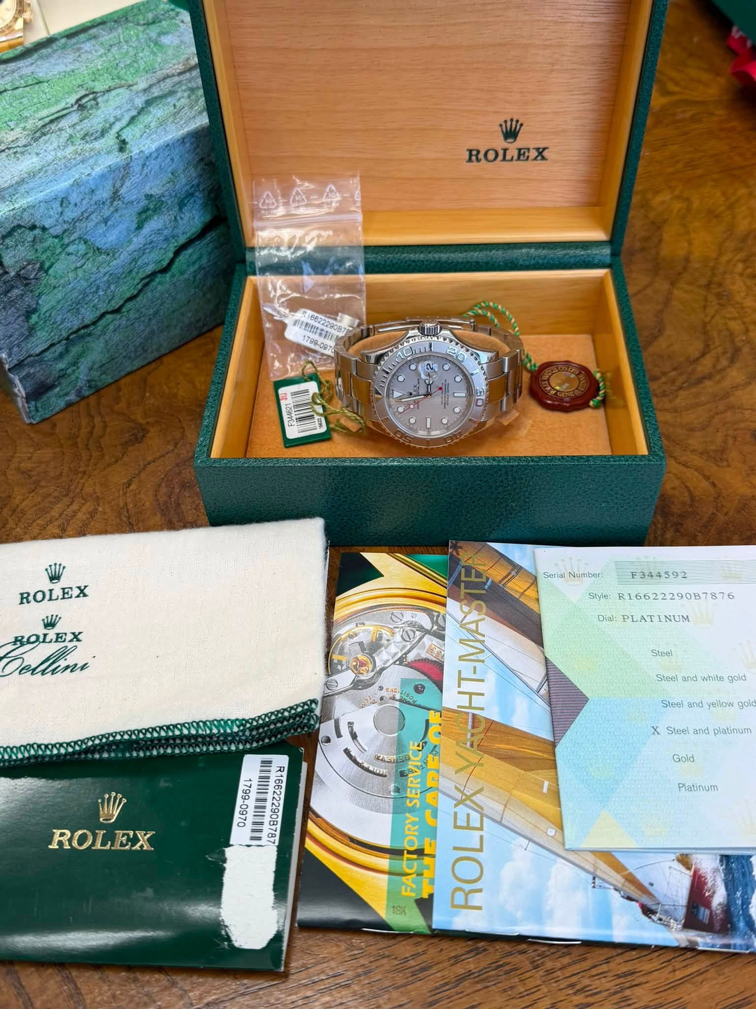 May be an image of wrist watch and text that says 'ROLEX 村E 有 1700.0mm Sn היצי ROLEX BOLEX Collini Steel Steet and gold Stoel yellow gold Steel nd platinum ROLEX Serial Numberi…