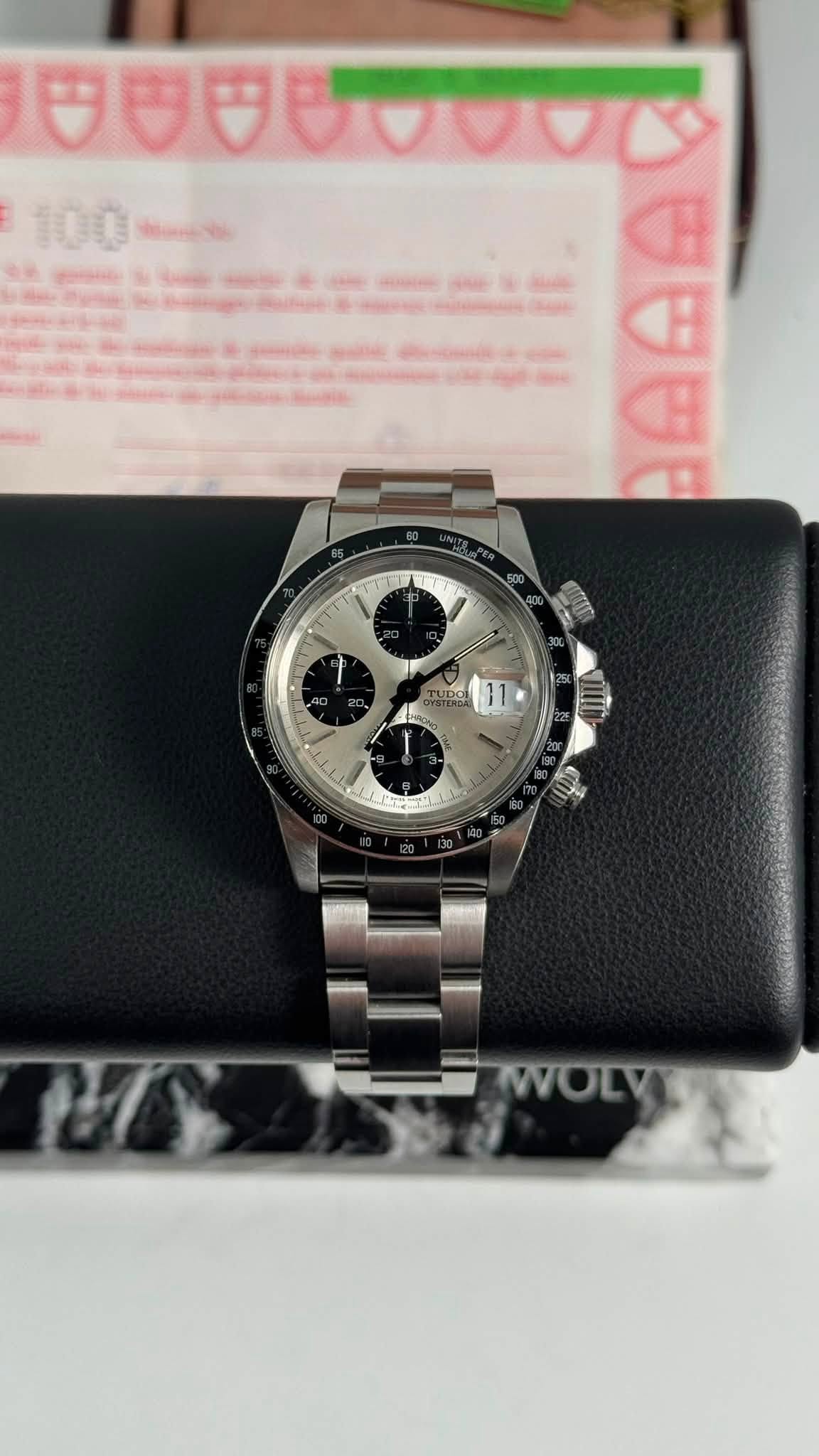May be an image of wrist watch and text