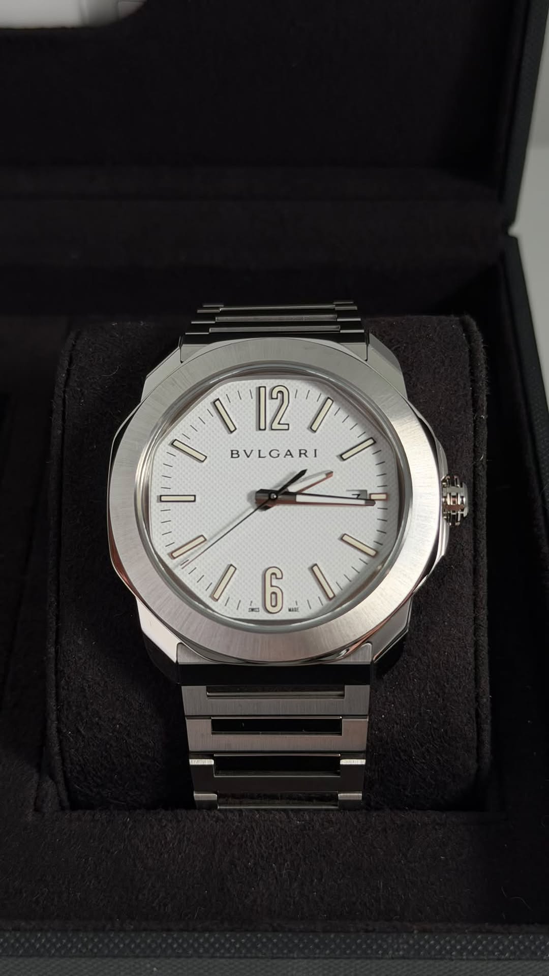May be an image of wrist watch and text