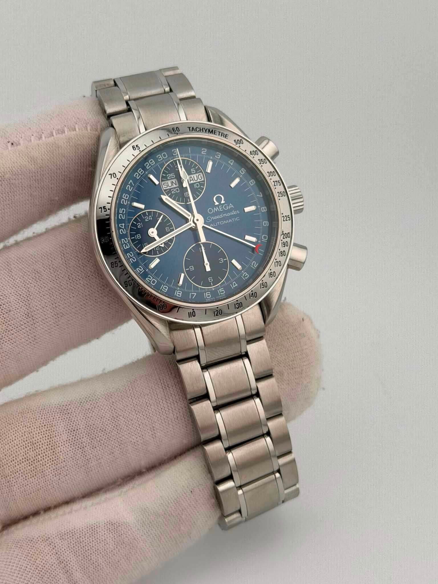 May be an image of wrist watch and text that says '65 30 60 TACHYMETRE 500 400 ရ 2 3 25 SUN AUG 0 250 ဏ Ω OMEGA AUTOMATIC e ε 22 2 9 0℃ I - ญ M 6 6 ធ 5 A 16 150'