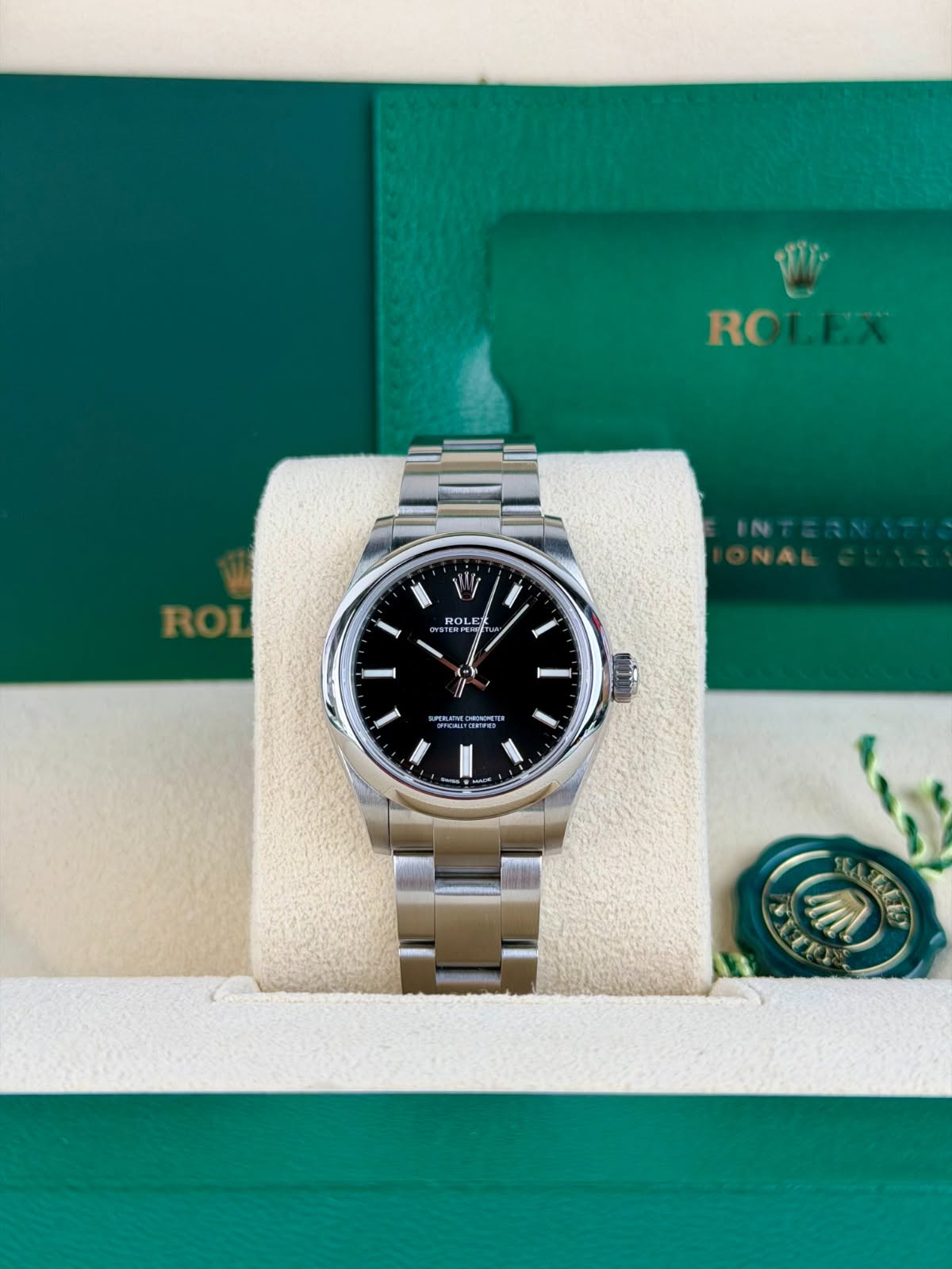May be an image of wrist watch and text