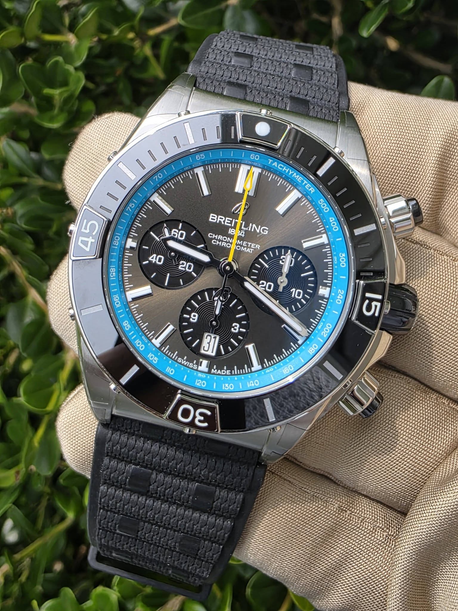 May be an image of wrist watch and text