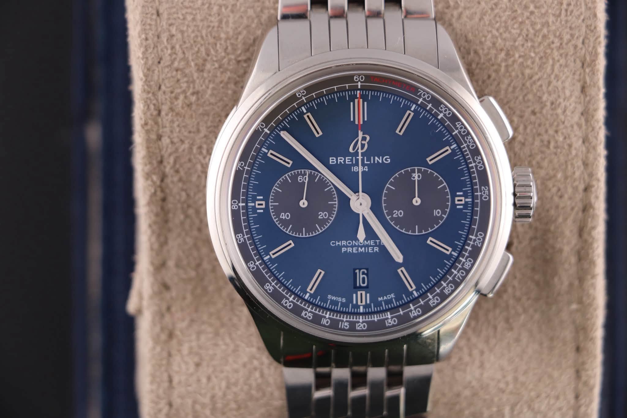 May be an image of wrist watch and text that says '60 65 7o I 1၃ B BREITLING LING BREI I 1O SB 20 0 O CHRONOMET PREMIER go S EL 95 ototed 16 100 .ارل SWISS IDI 105 wwwии!!…