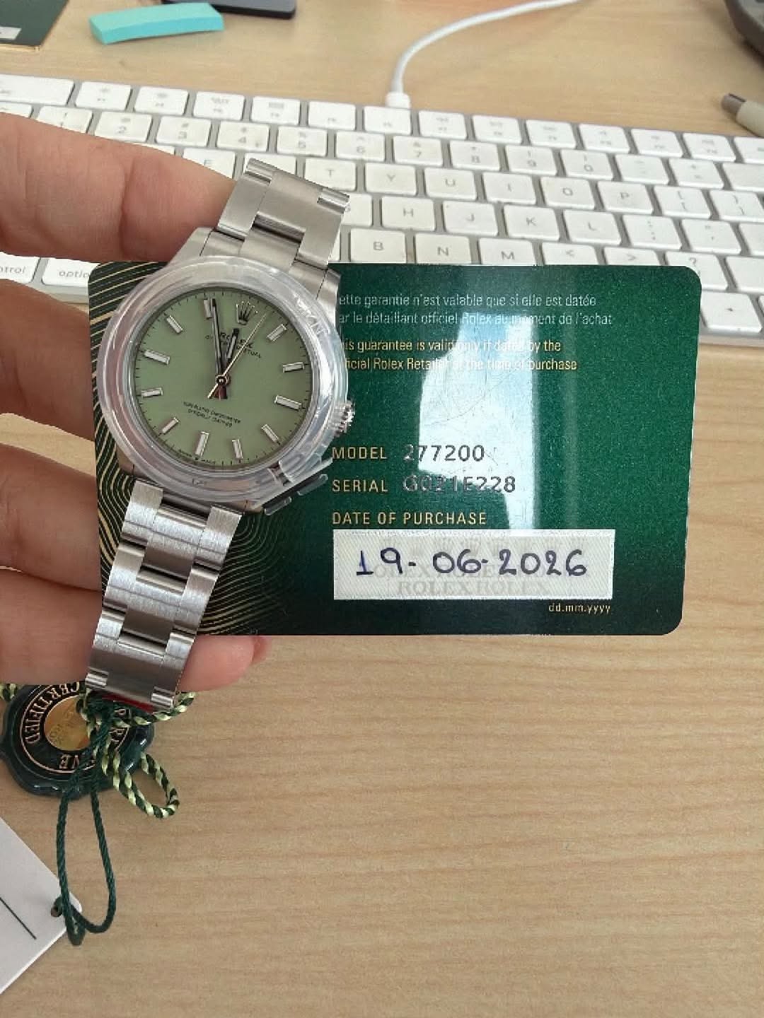 May be an image of wrist watch and text
