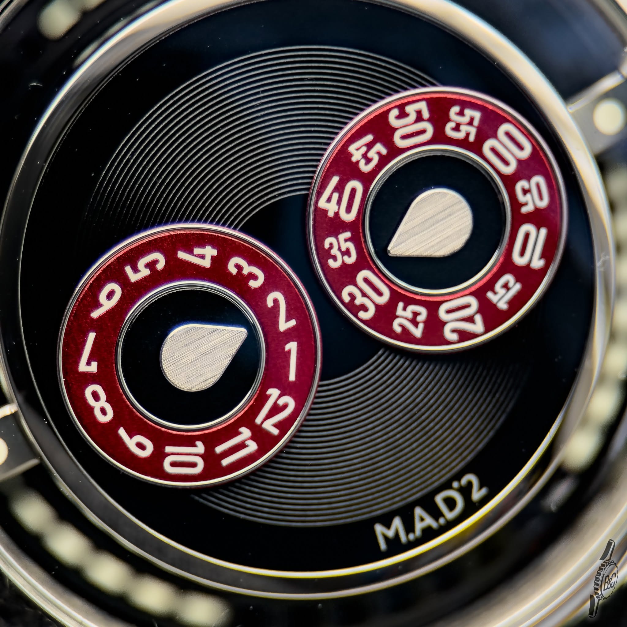 May be an image of wrist watch and text that says 'ធមអ স्र 0O ఓ 40 GO ל さ ന 35 O 20 DE οι o ر ထ 9 양금크스 아르 12 M.A.D2 M.A.D2'