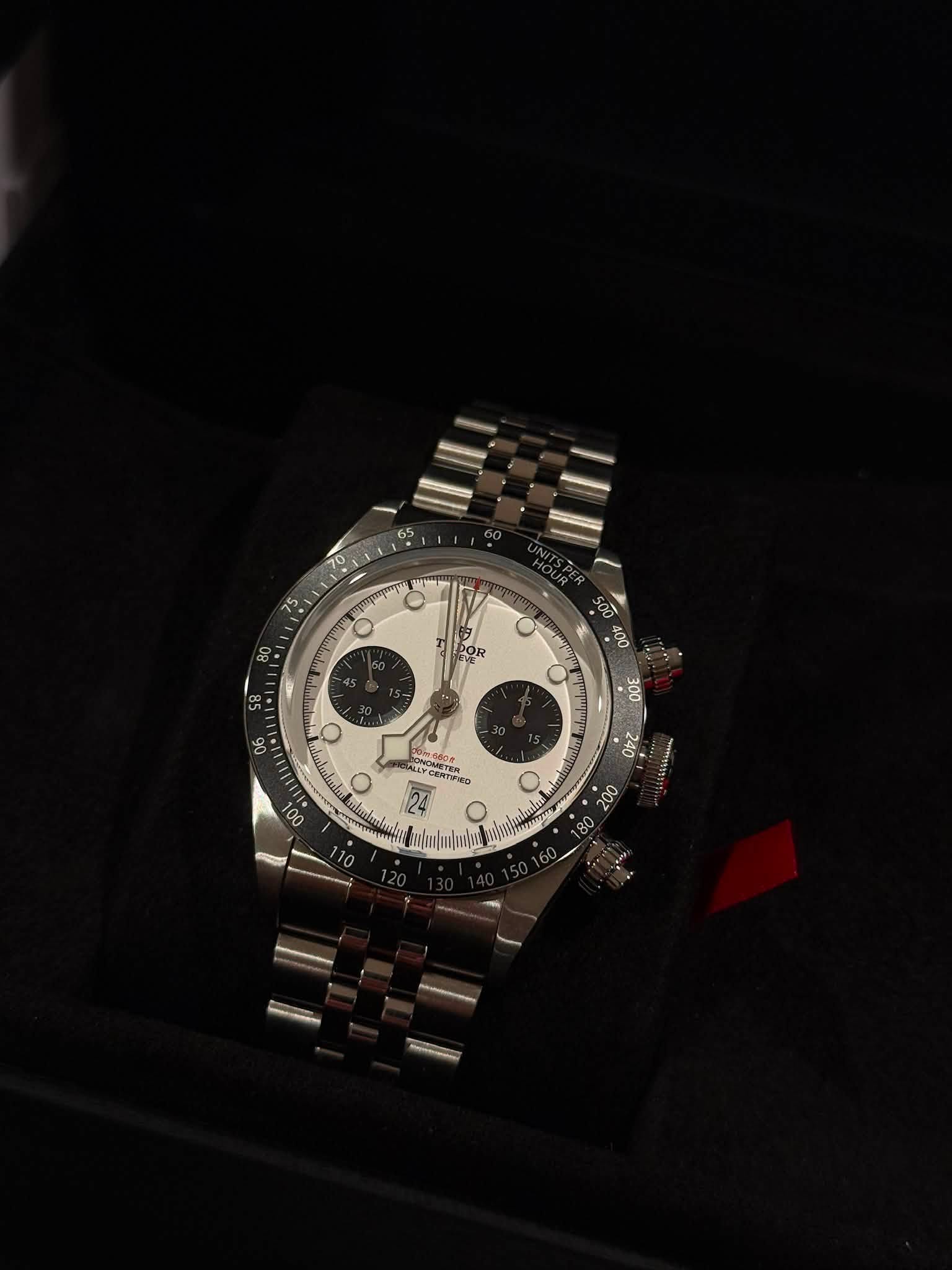 May be an image of wrist watch and text