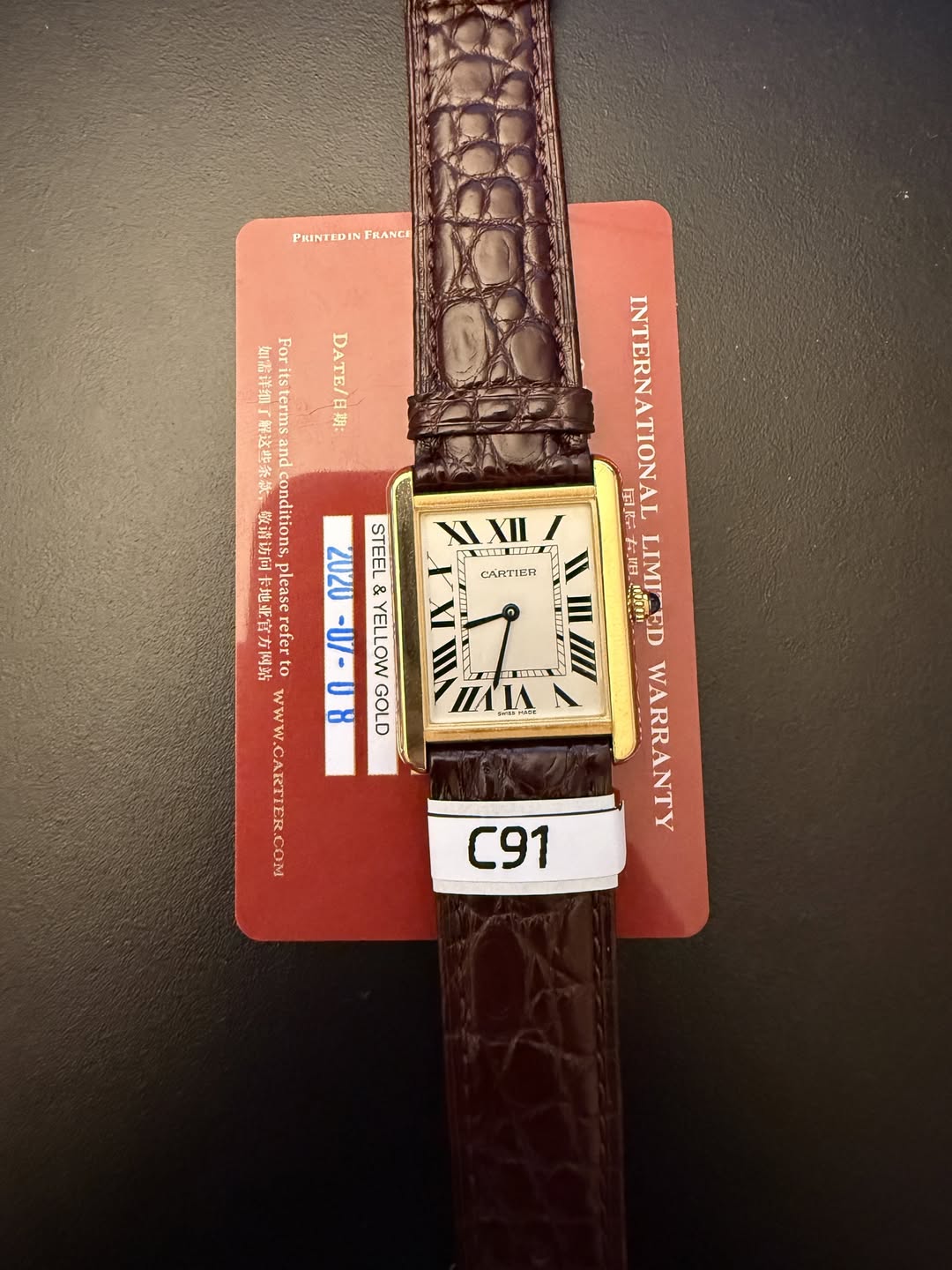 May be an image of digital watch, leather and text that says 'PIUNTEDIN DIN FRANCE 如點详細 its Fori DATE/日期: 「解这些条款 and terms 效请访问 conditions, 事地亚官方网站 門站 please 2020 お L refer ス、…
