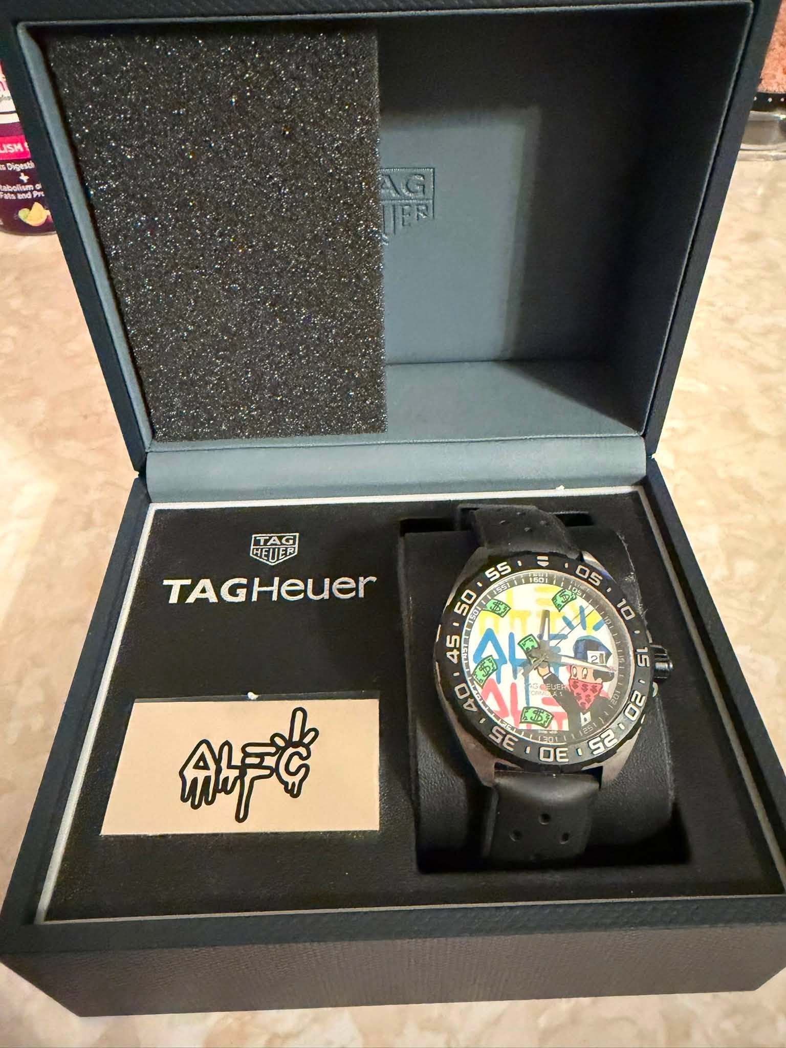 May be an image of digital watch and text