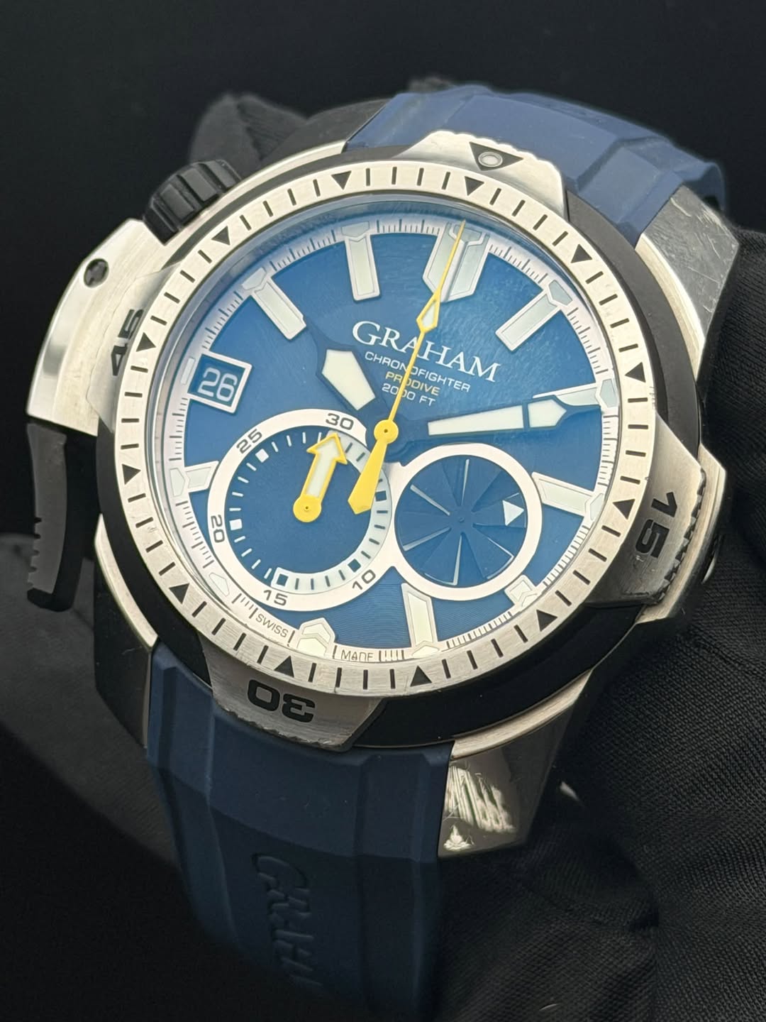 May be an image of wrist watch and text