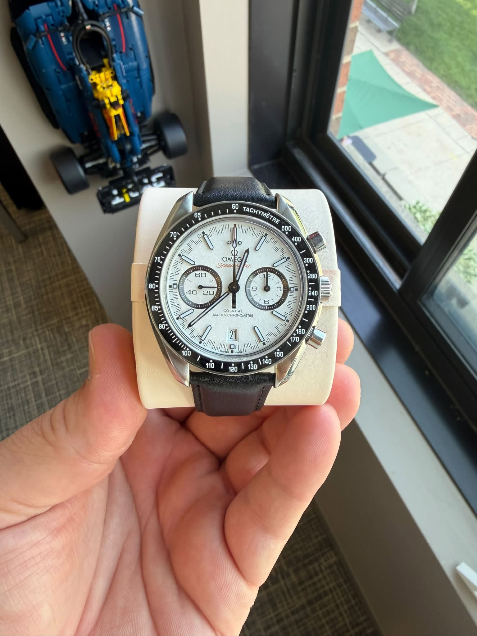 May be an image of wrist watch and text