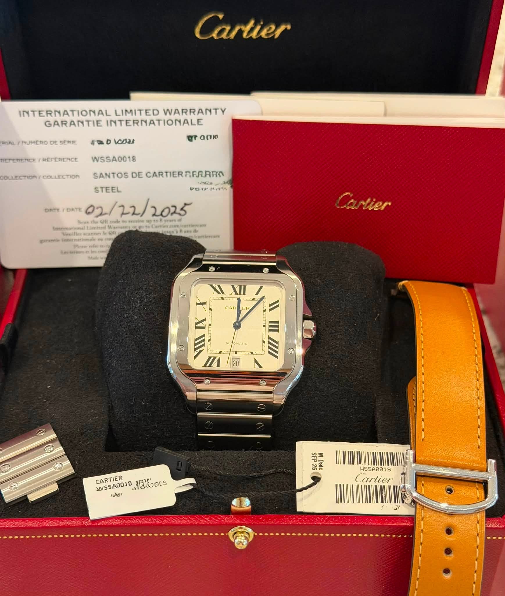 May be an image of wrist watch and text
