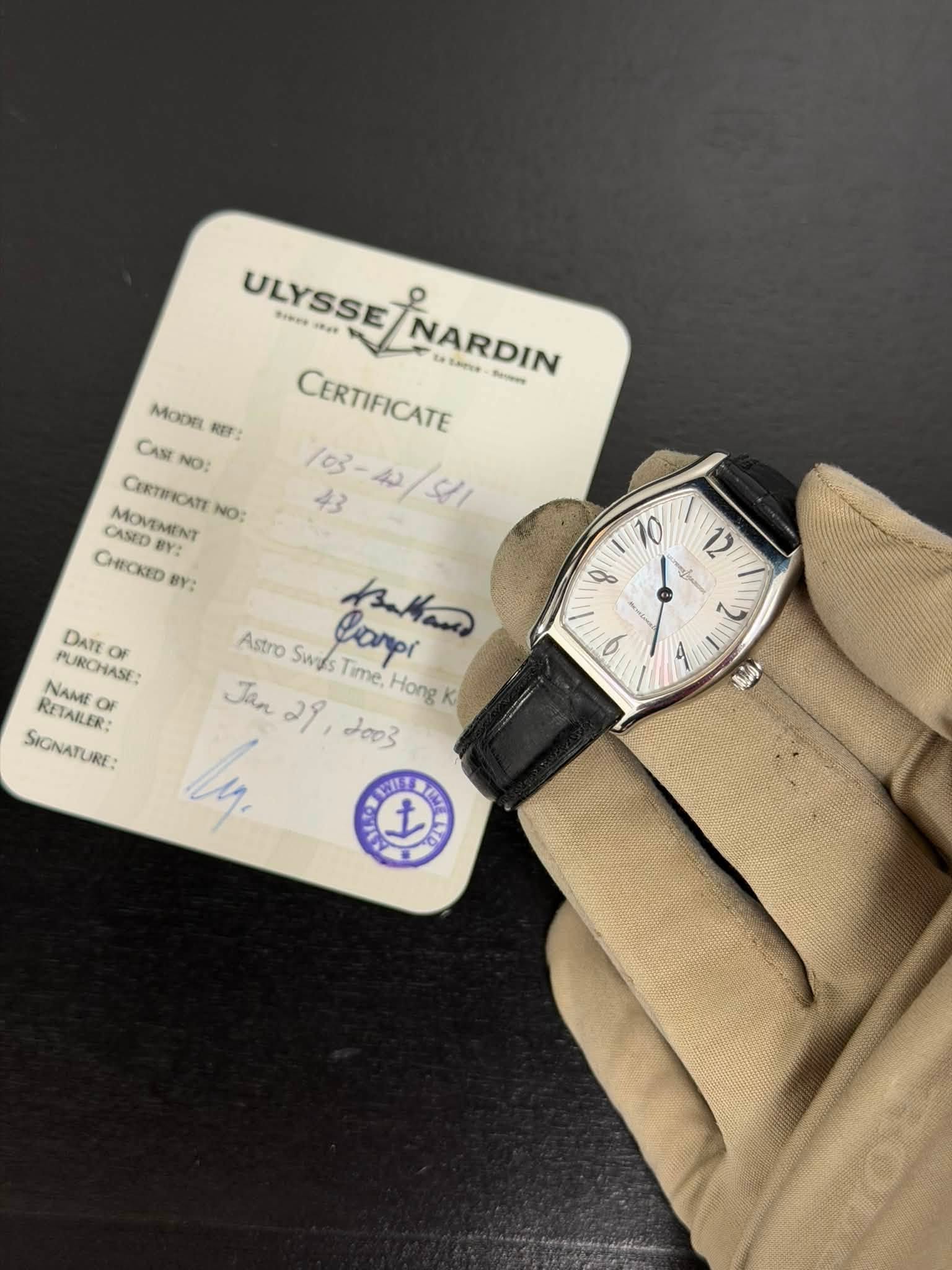 May be an image of wrist watch and text that says 'MODE REF: CAS NO: CERTIICATE NO: MOMEMENT CASED CHECKED BY: ULYSSE Ia и NARDIN Lene Sa Katama CERTIFICATE 43 -ل/له Astro Swas…