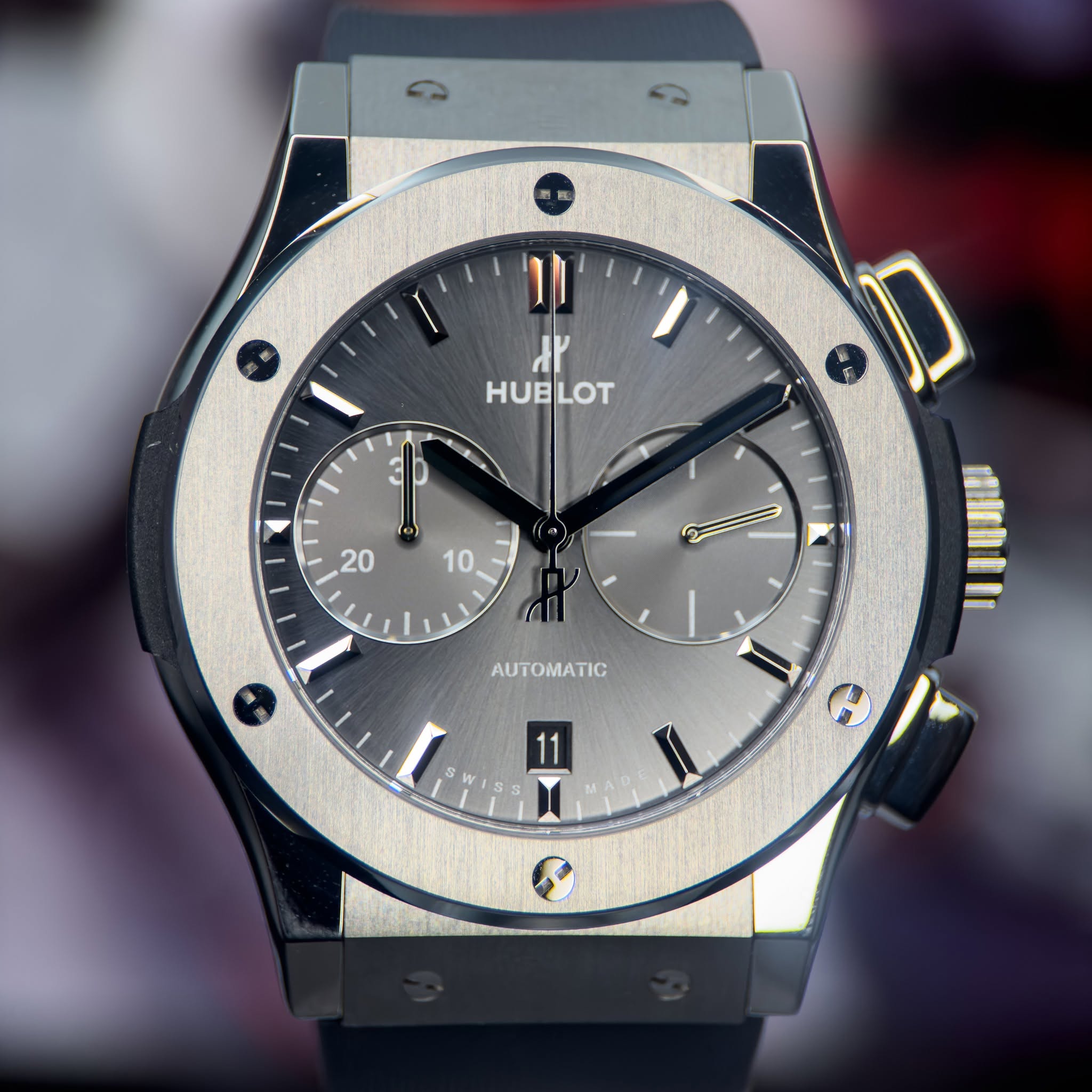 May be an image of wrist watch and text that says '۲۲ HUBLOT HUBI 20 10 I AUTOMATIC iihtli 11 1 S T'