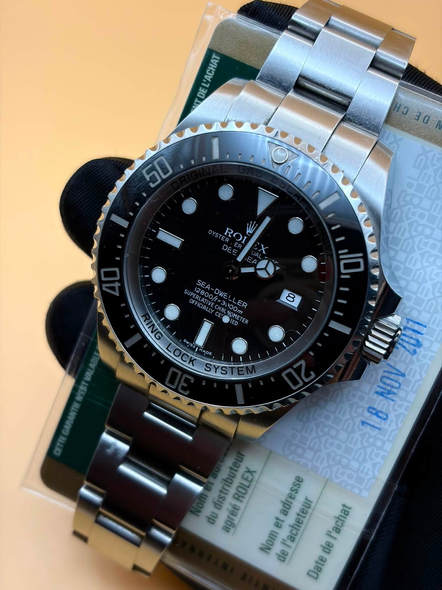 May be an image of wrist watch and text that says ''ACHAT DE ១ ၁3၀ 0 50 Oec ROI W SEA- 8 NOV 8 ROLEX du distribute agrééROLEX adresse 'acheteur agréé et de del'acheteur 'achat Nom…