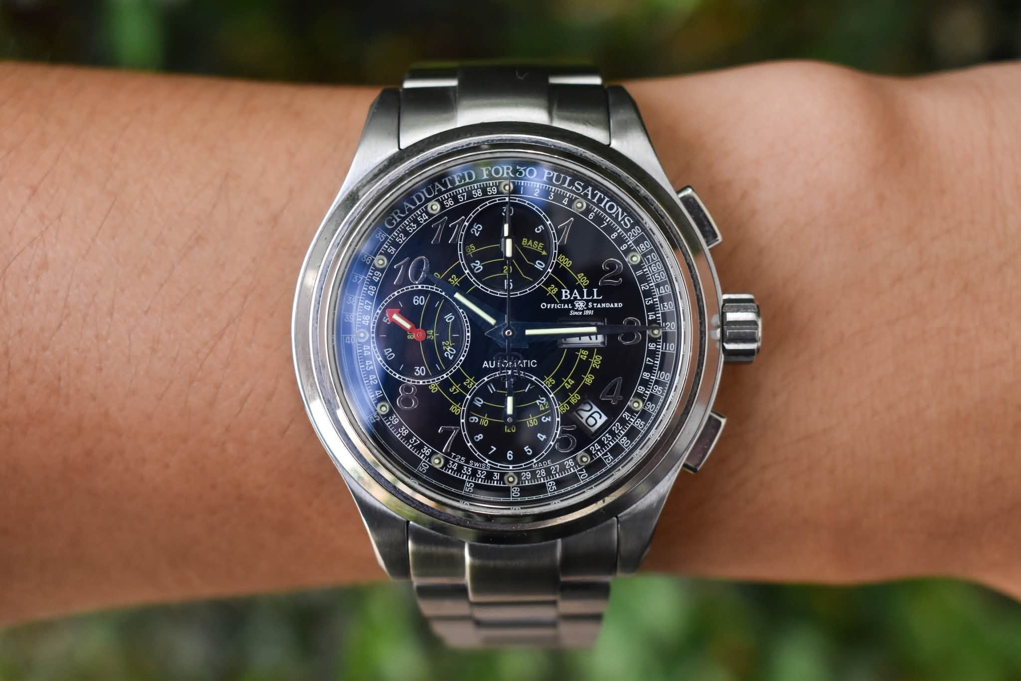 May be an image of wrist watch and text