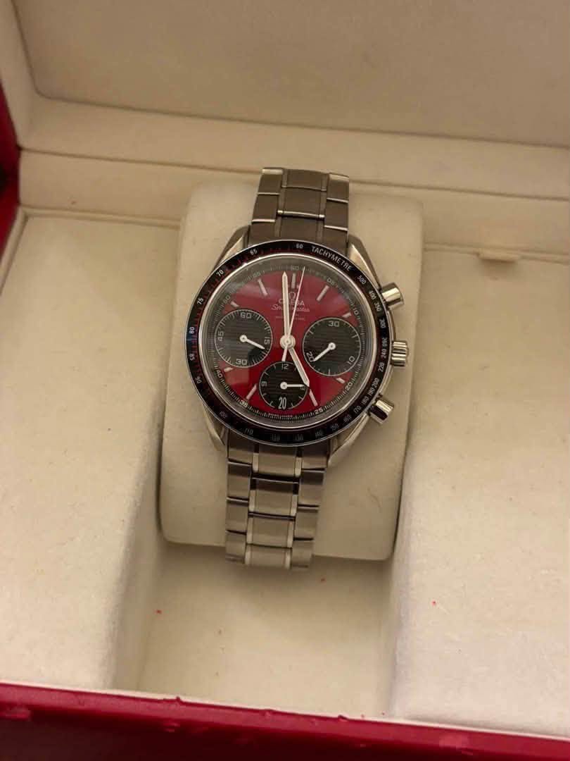 May be an image of wrist watch and text that says 'O'