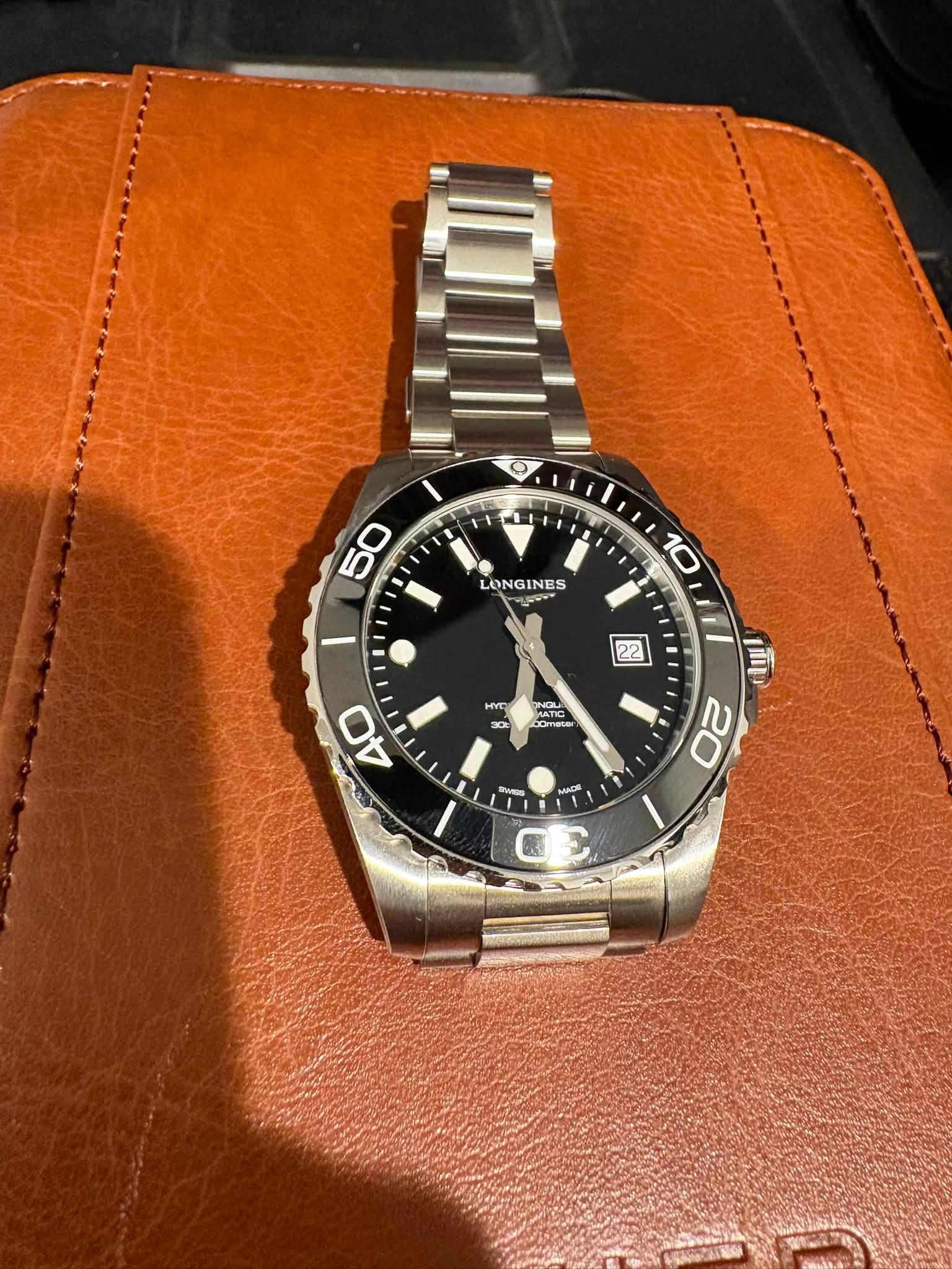 May be an image of wrist watch and text that says '50 LONG LONGINES NES まり 10 22 22 Hyc C 30 ONCL M NGLA MATIG Omea Dmete 40 የ 20 MANDIE 台'