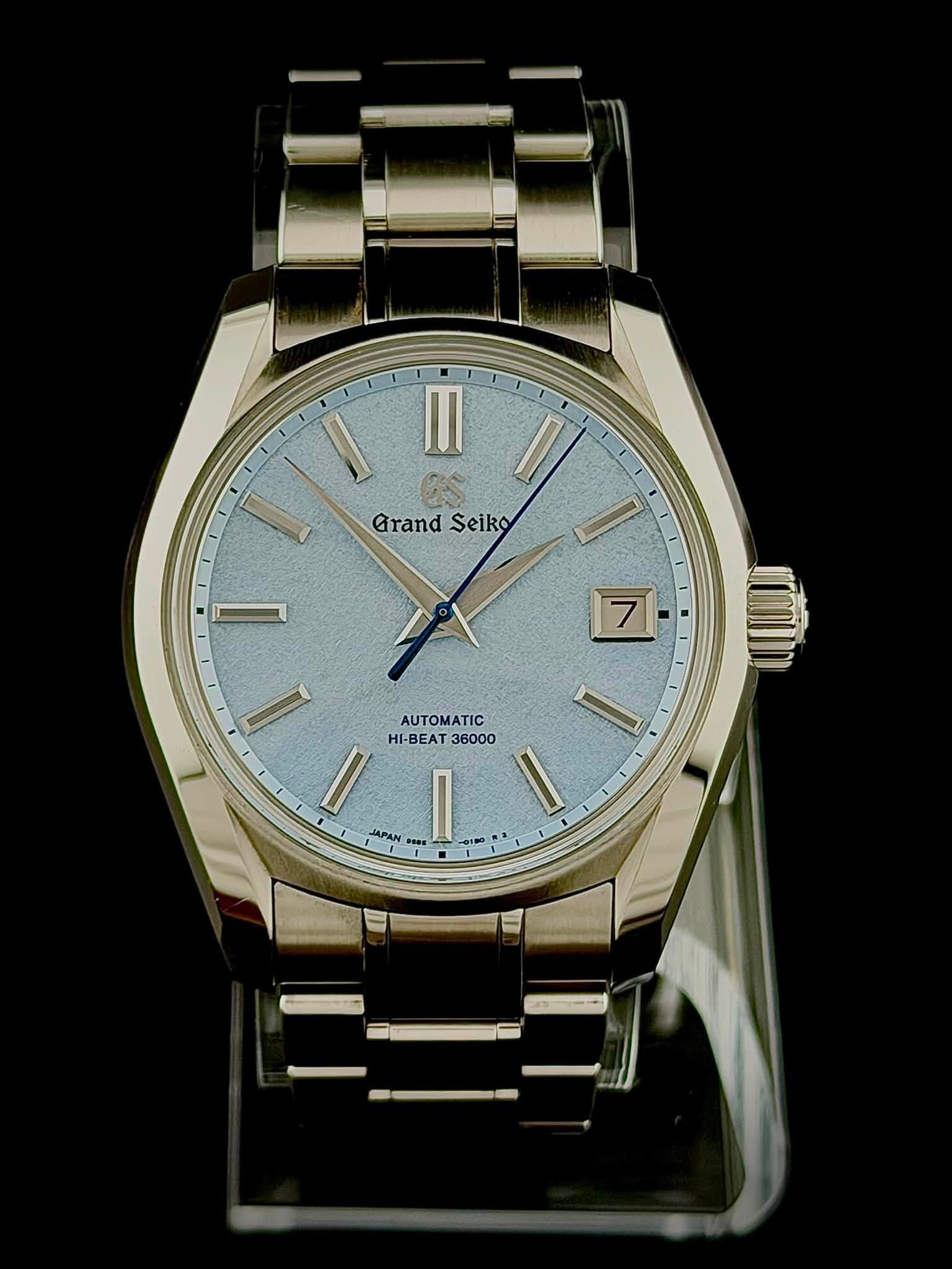 May be an image of wrist watch and text that says '三司 I es II II Grand GrandSeiko Seiko I 7 ١ AUTOMATIC HI-BEAT HI-BEAT36000 36000 1I I II JAPAN 0100'