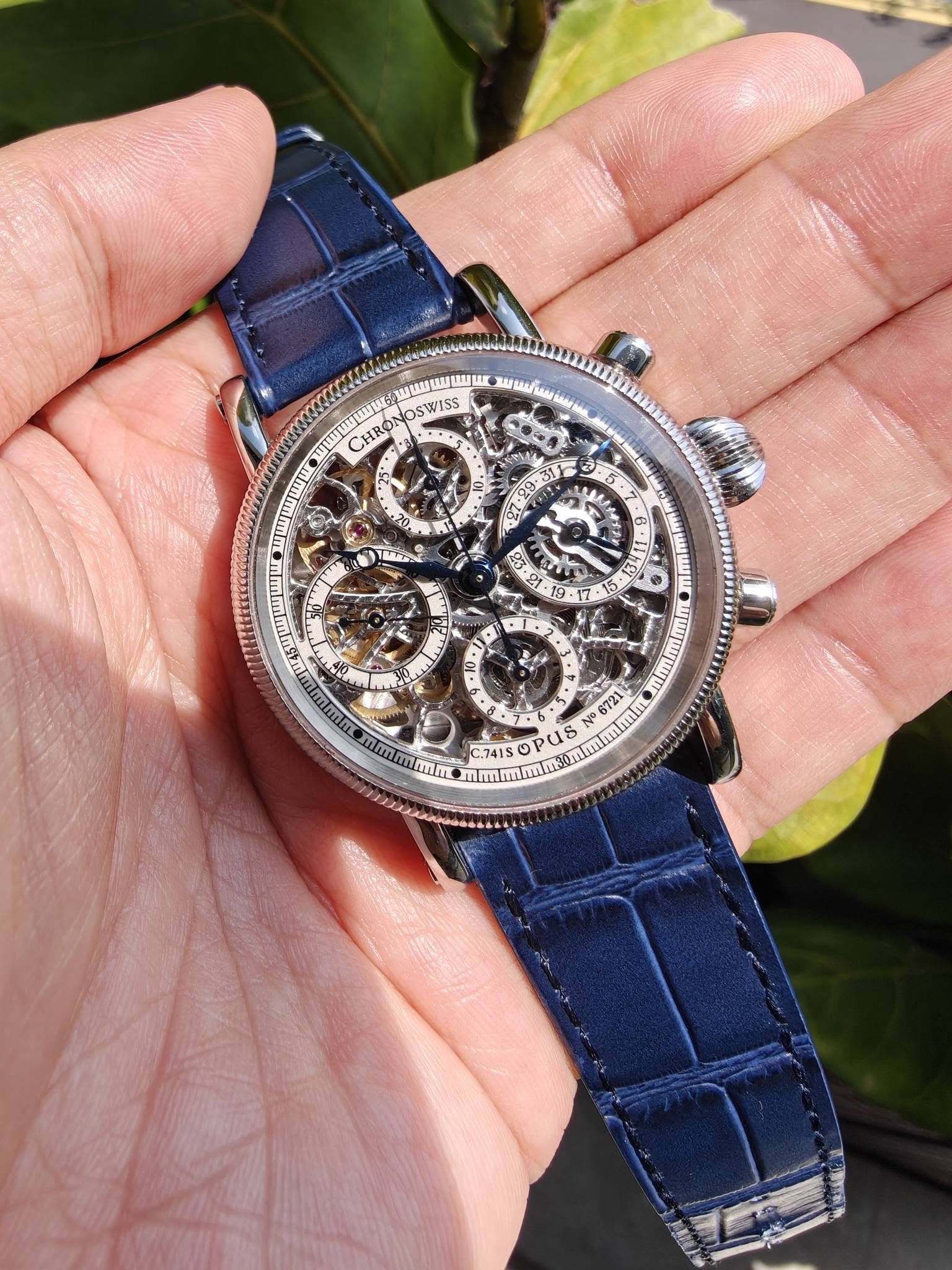 May be an image of wrist watch and text