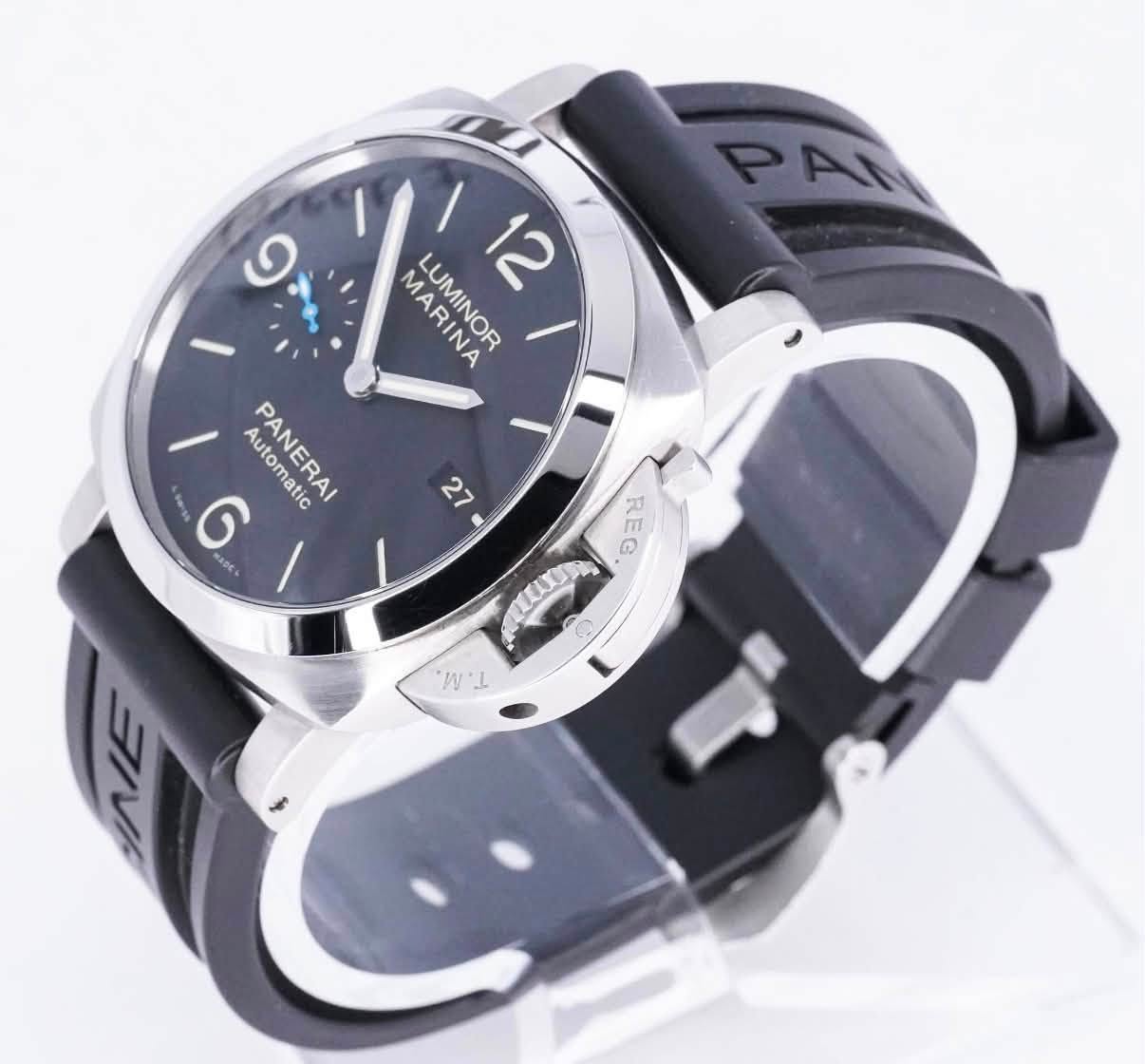 May be an image of digital watch and text that says 'PAN ١ MARINA LUMINOR 12 9 ፍት ១ Automatic AutonRA PANERAI MADEA 6 4DC 27 色 EC ၁ REG. RE REG R O W'L W I'