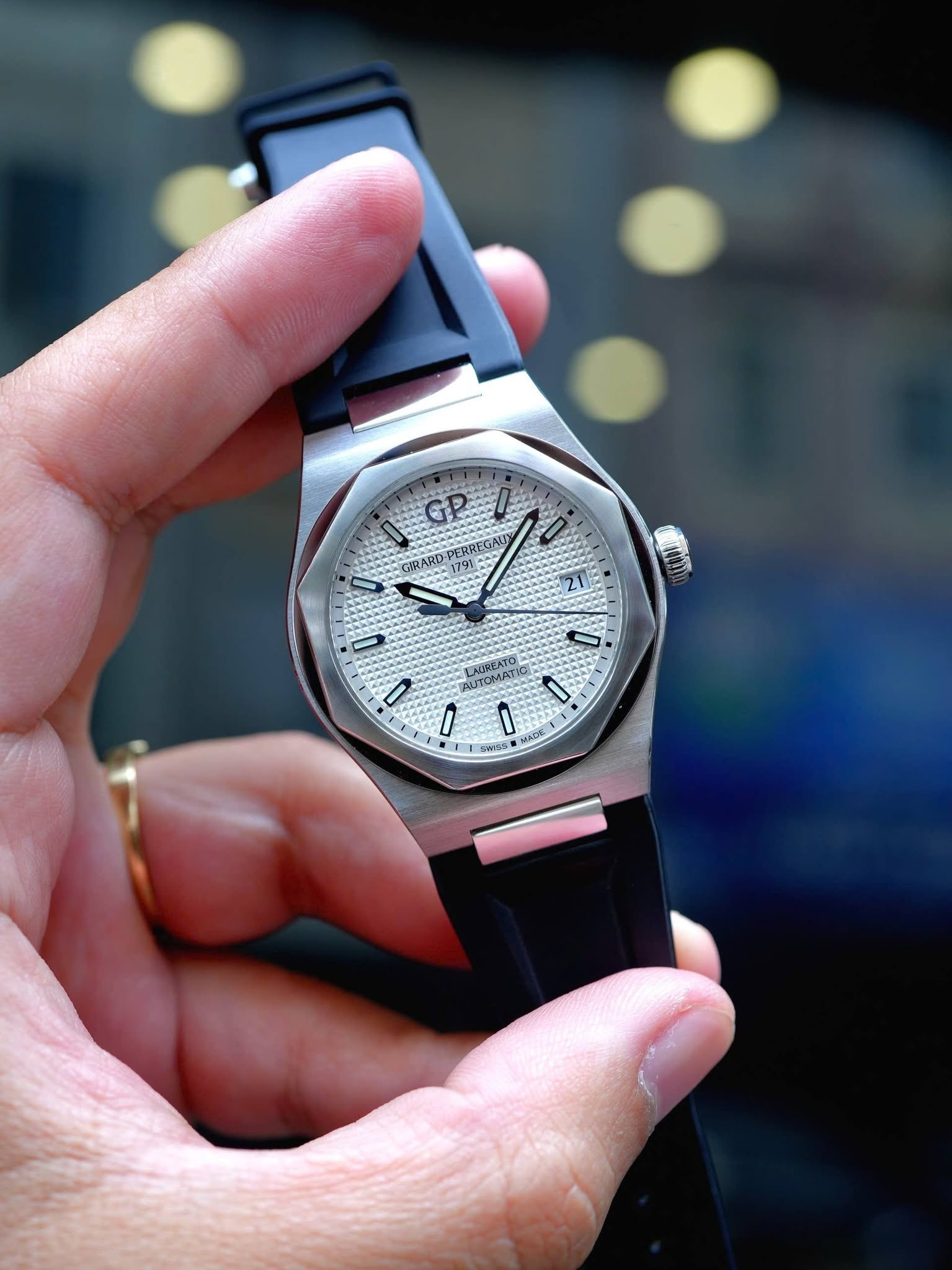 May be an image of digital watch and text