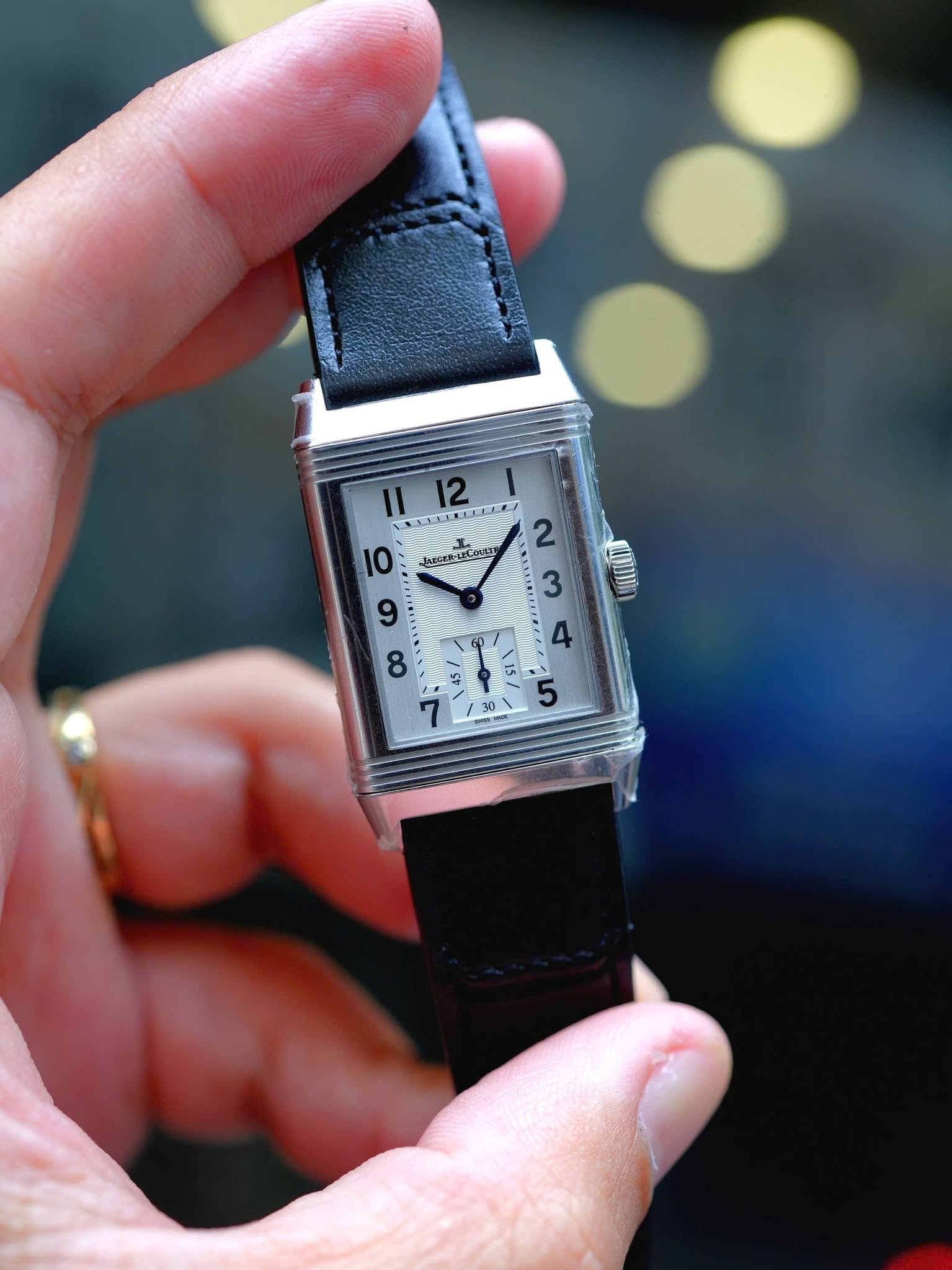 May be an image of digital watch and text