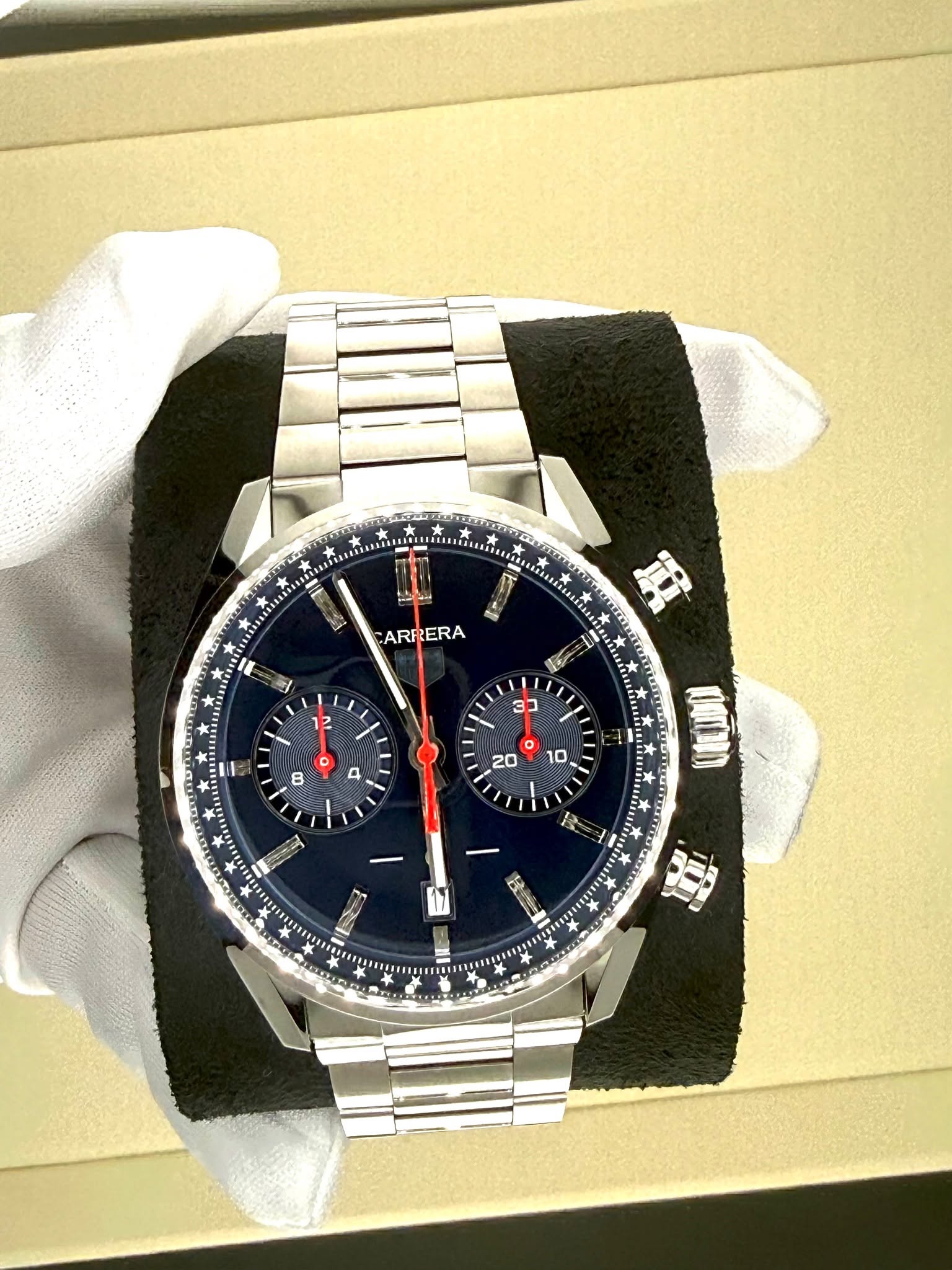 May be an image of wrist watch and text