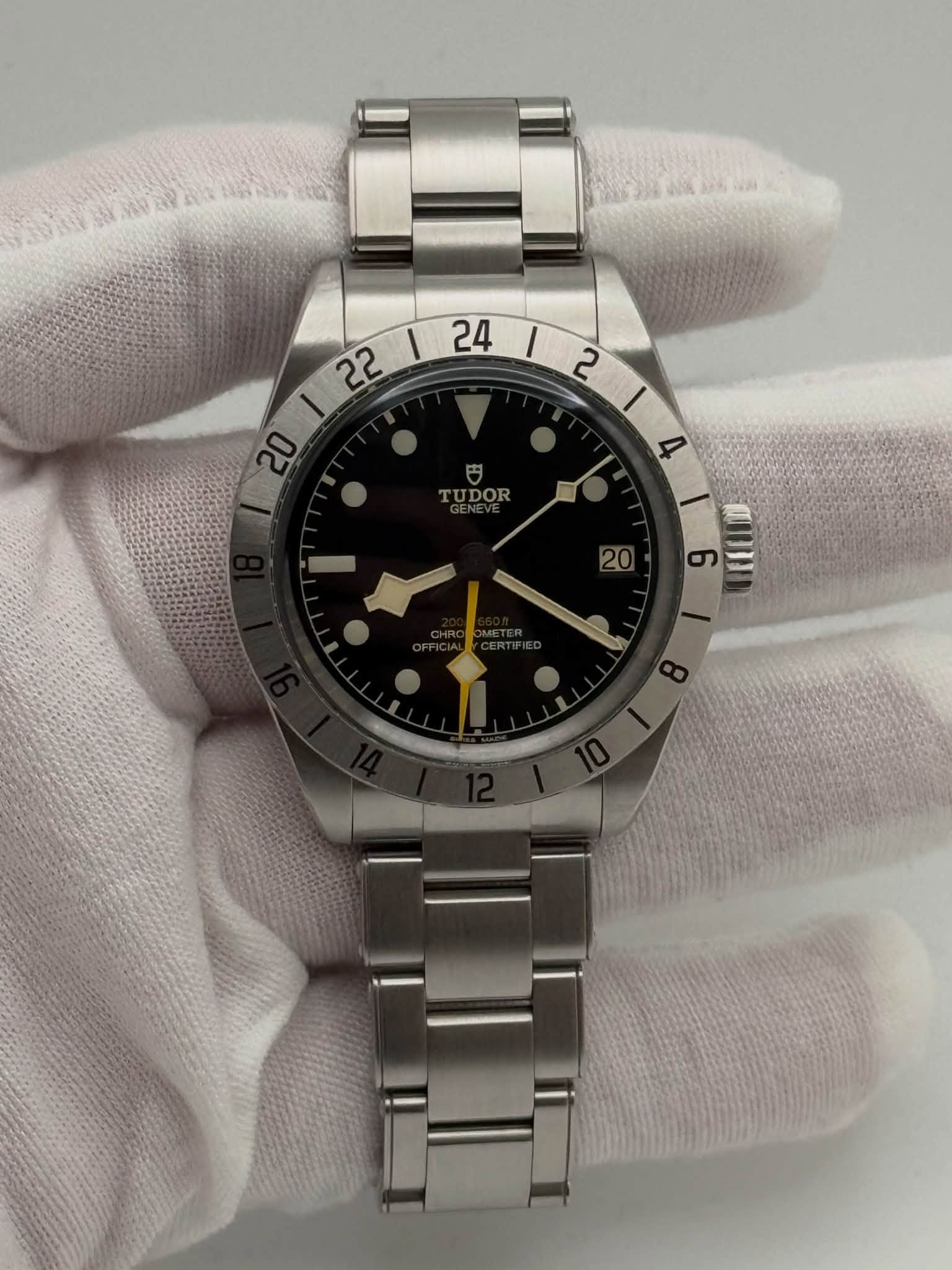 May be an image of wrist watch and text